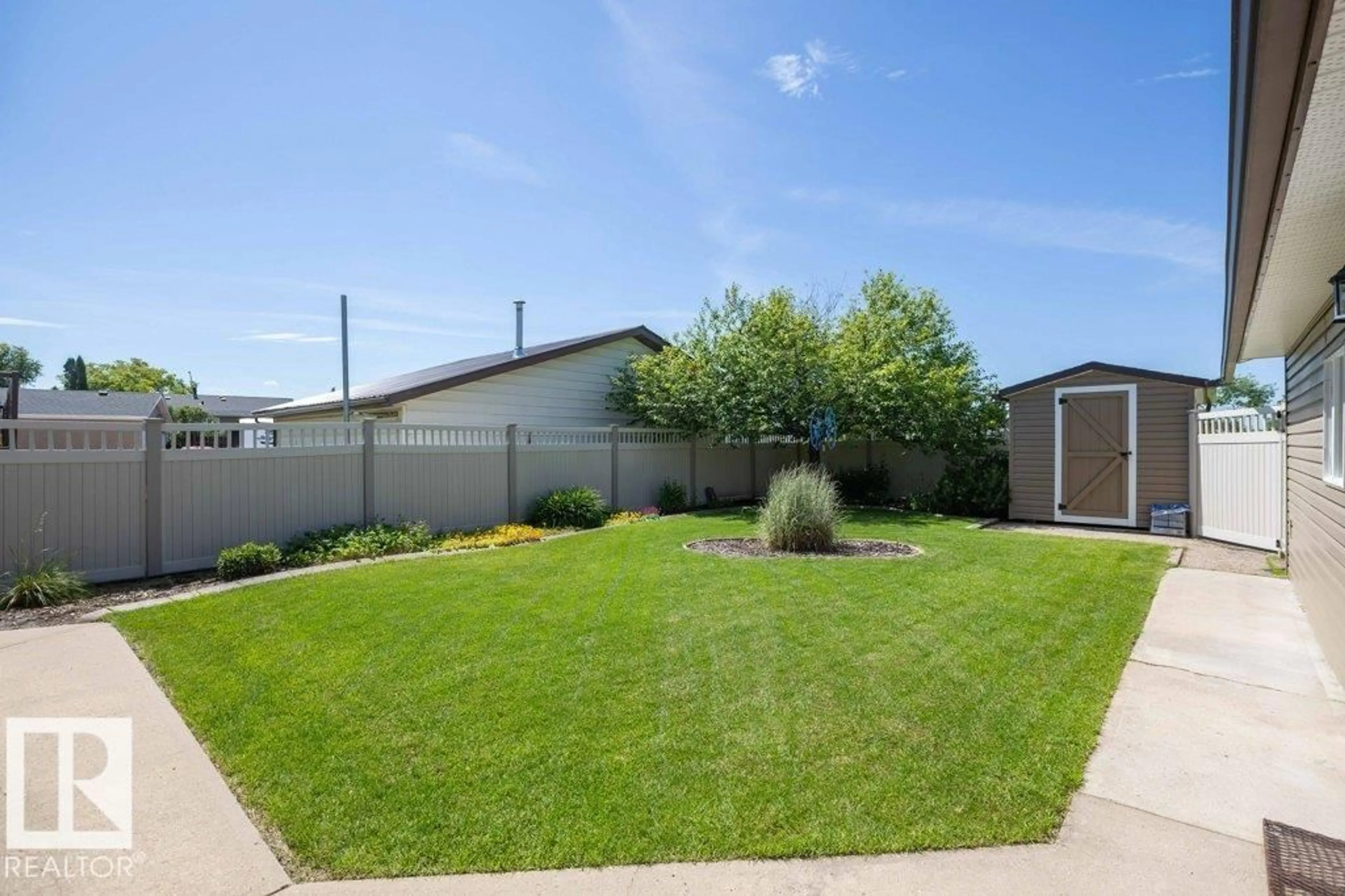 A pic from outside/outdoor area/front of a property/back of a property/a pic from drone, street for 10420 111 AV, Westlock Alberta T7P1E9