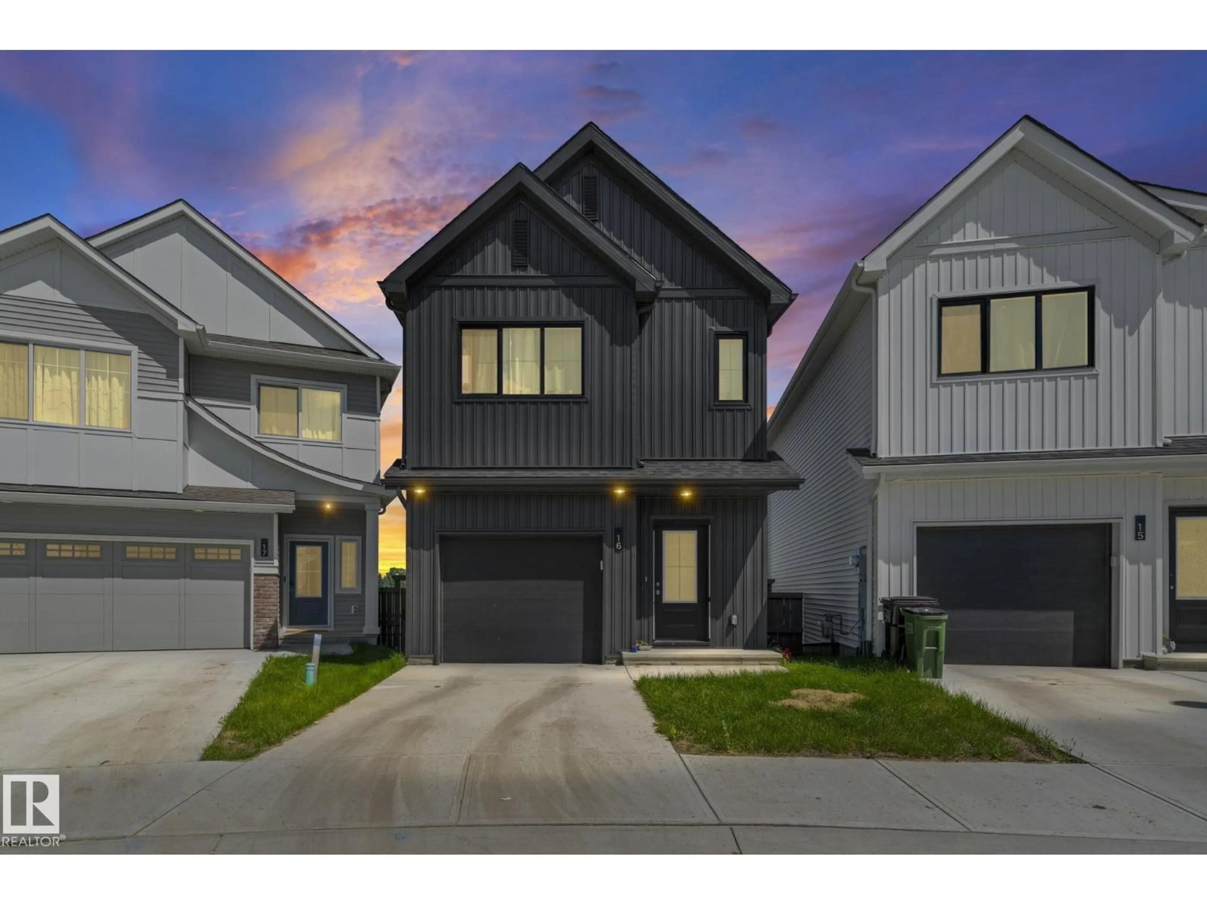 Home with vinyl exterior material, street for 16 19904 31 AV NW, Edmonton Alberta T6M1N7