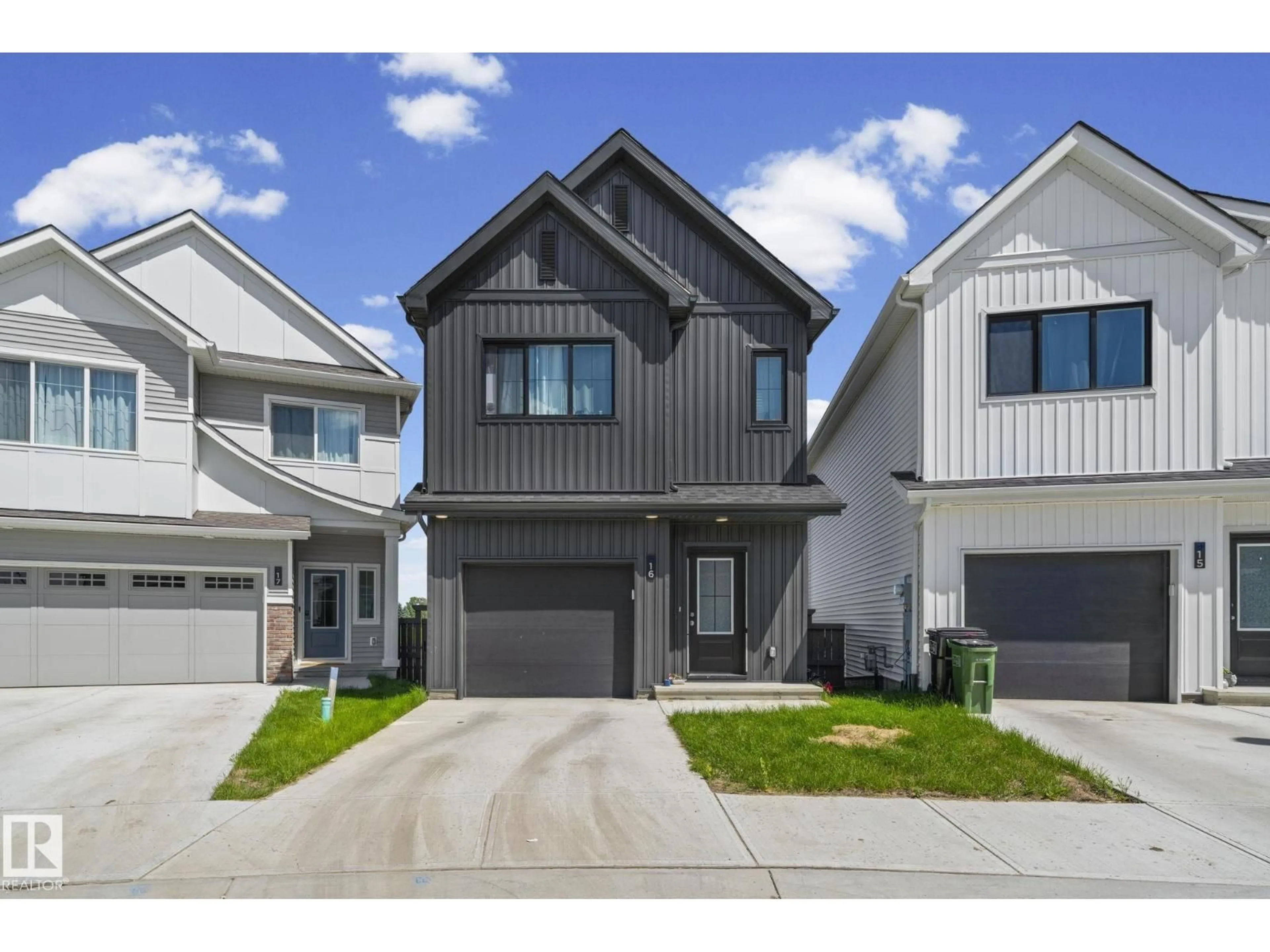 Home with vinyl exterior material, street for 16 19904 31 AV NW, Edmonton Alberta T6M1N7