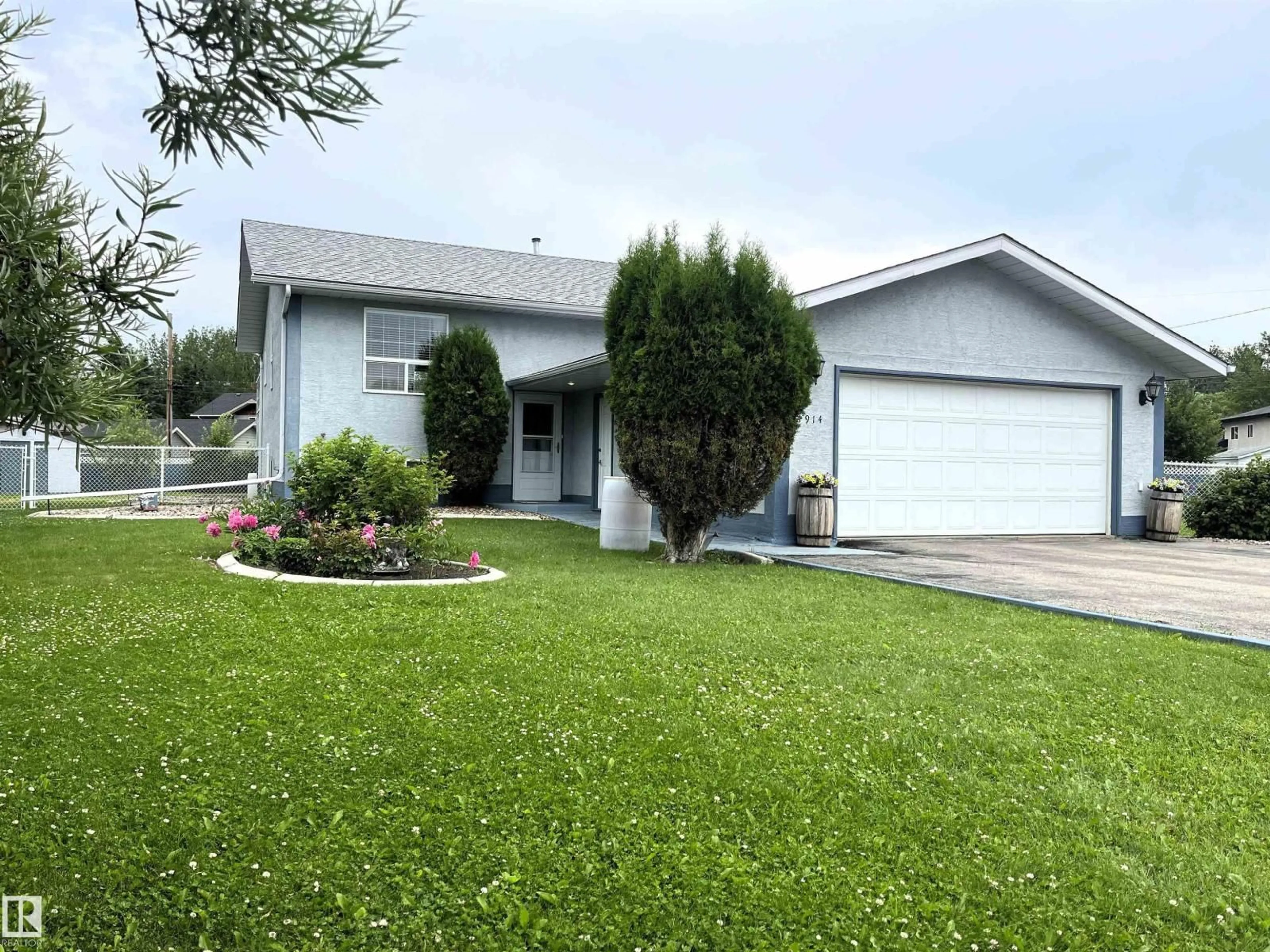 Home with vinyl exterior material, street for 4914 51 AVE, Entwistle Alberta T0E0S0