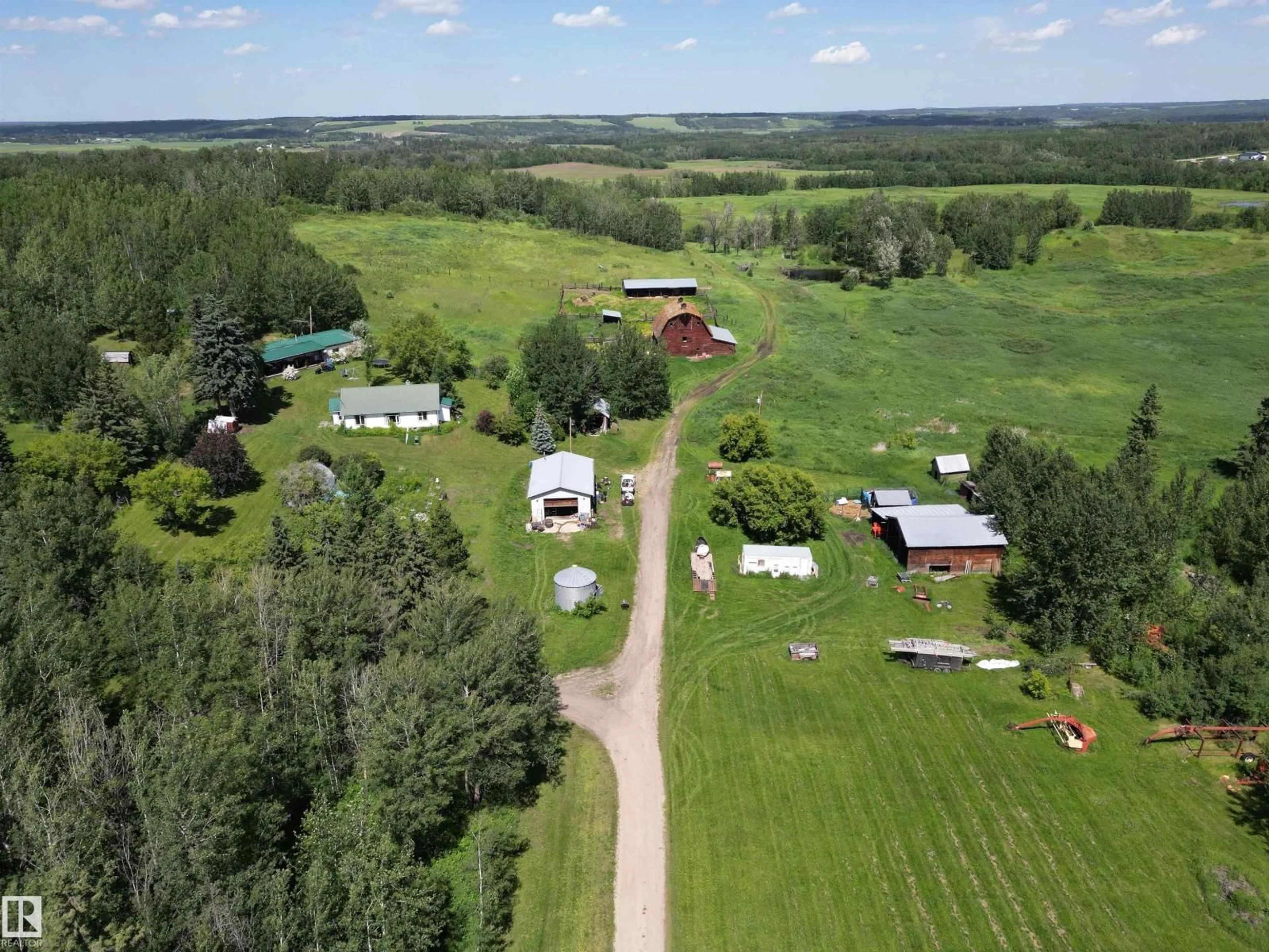 A pic from outside/outdoor area/front of a property/back of a property/a pic from drone, forest/trees view for 1524A TWP ROAD 544, Rural Lac Ste. Anne County Alberta T0E1V0