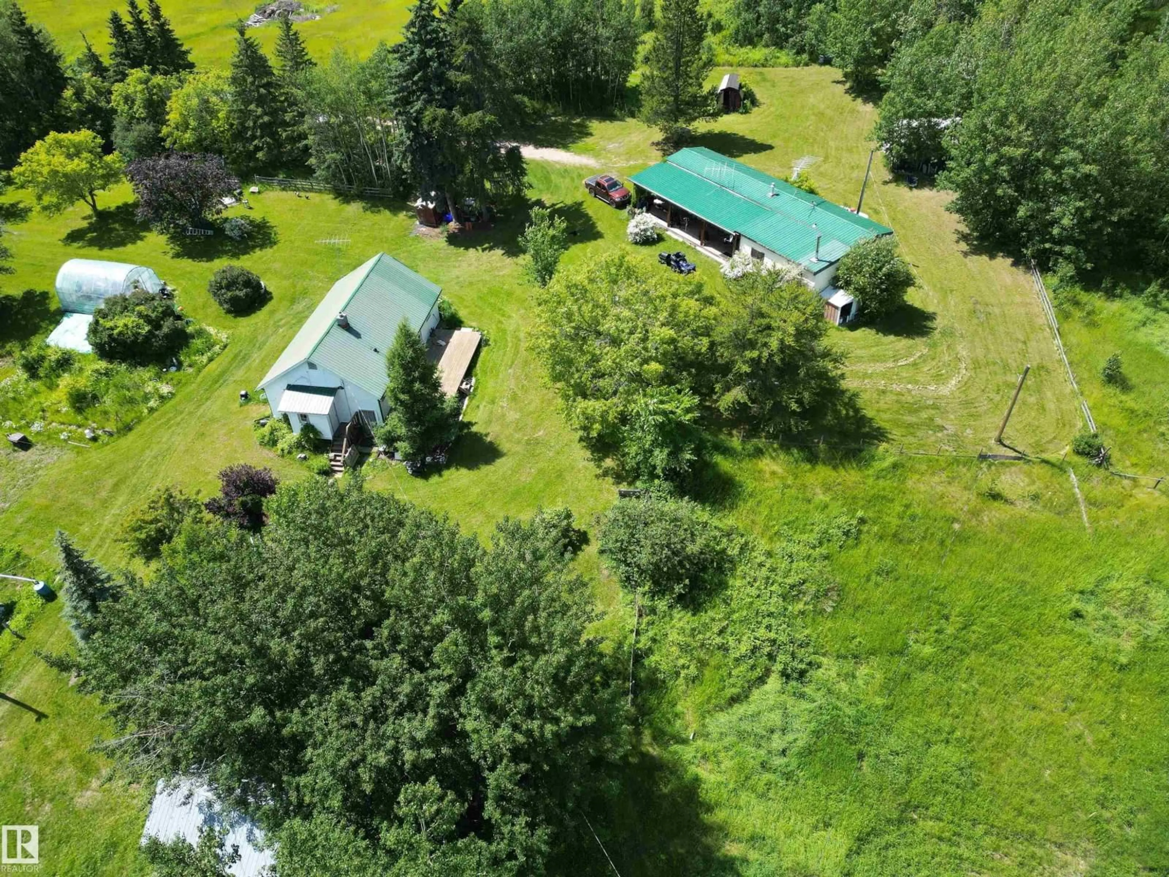 A pic from outside/outdoor area/front of a property/back of a property/a pic from drone, forest/trees view for 1524A TWP ROAD 544, Rural Lac Ste. Anne County Alberta T0E1V0