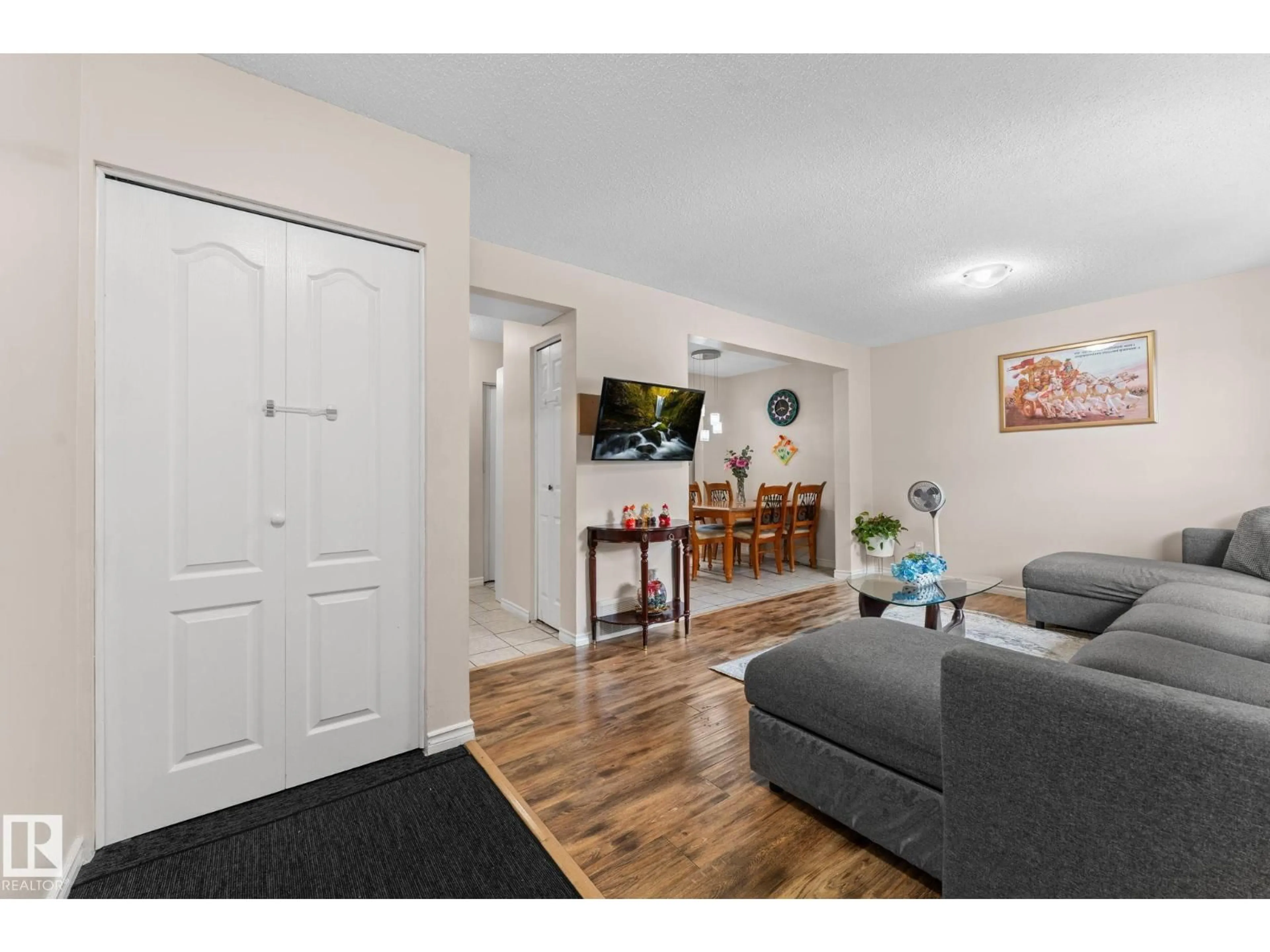 Living room with furniture, wood/laminate floor for NW - 359 NORTHGATE TC, Edmonton Alberta T5E3E3