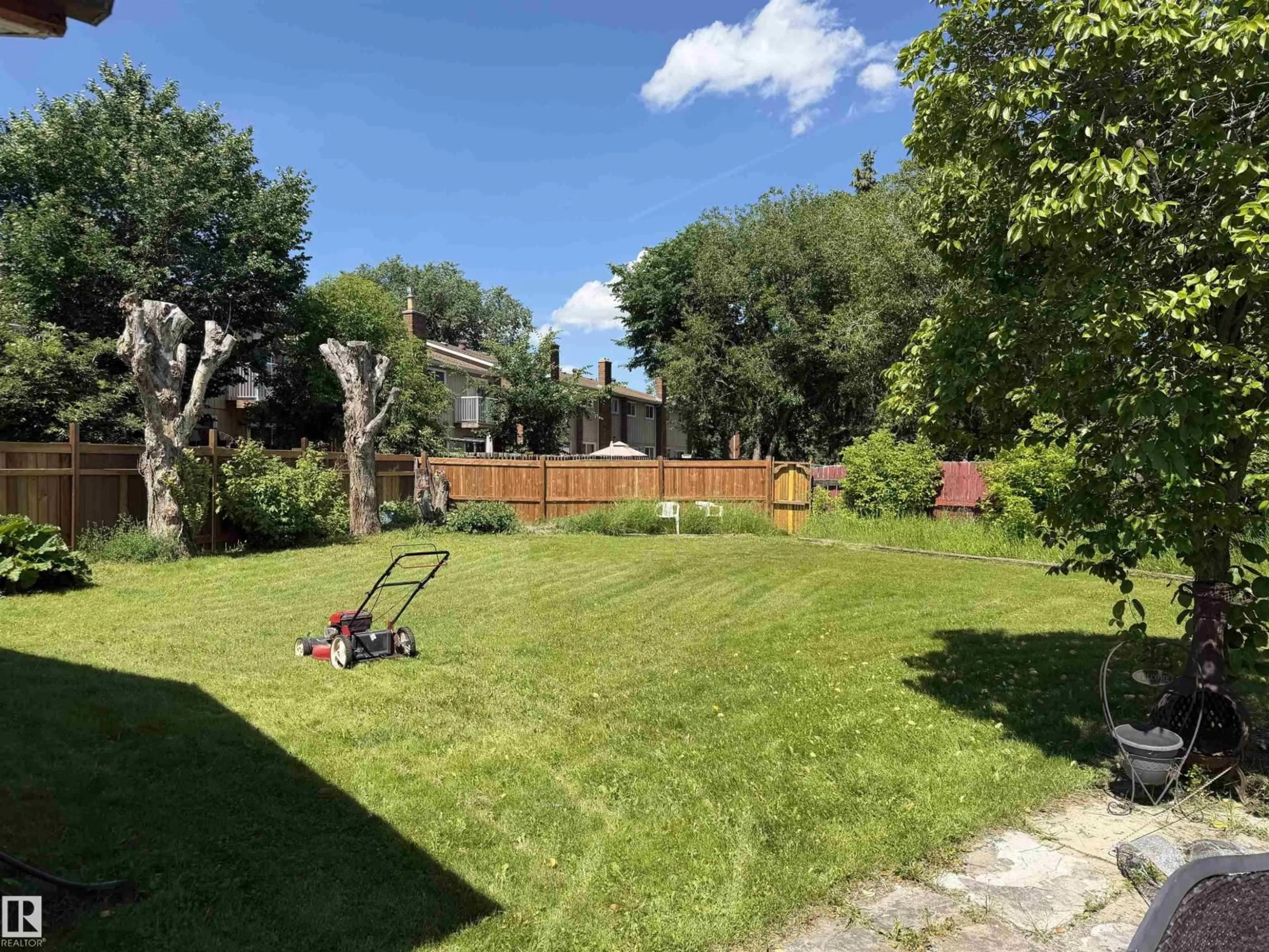 A pic from outside/outdoor area/front of a property/back of a property/a pic from drone, forest/trees view for NW - 13050 32A ST, Edmonton Alberta T5A3E5