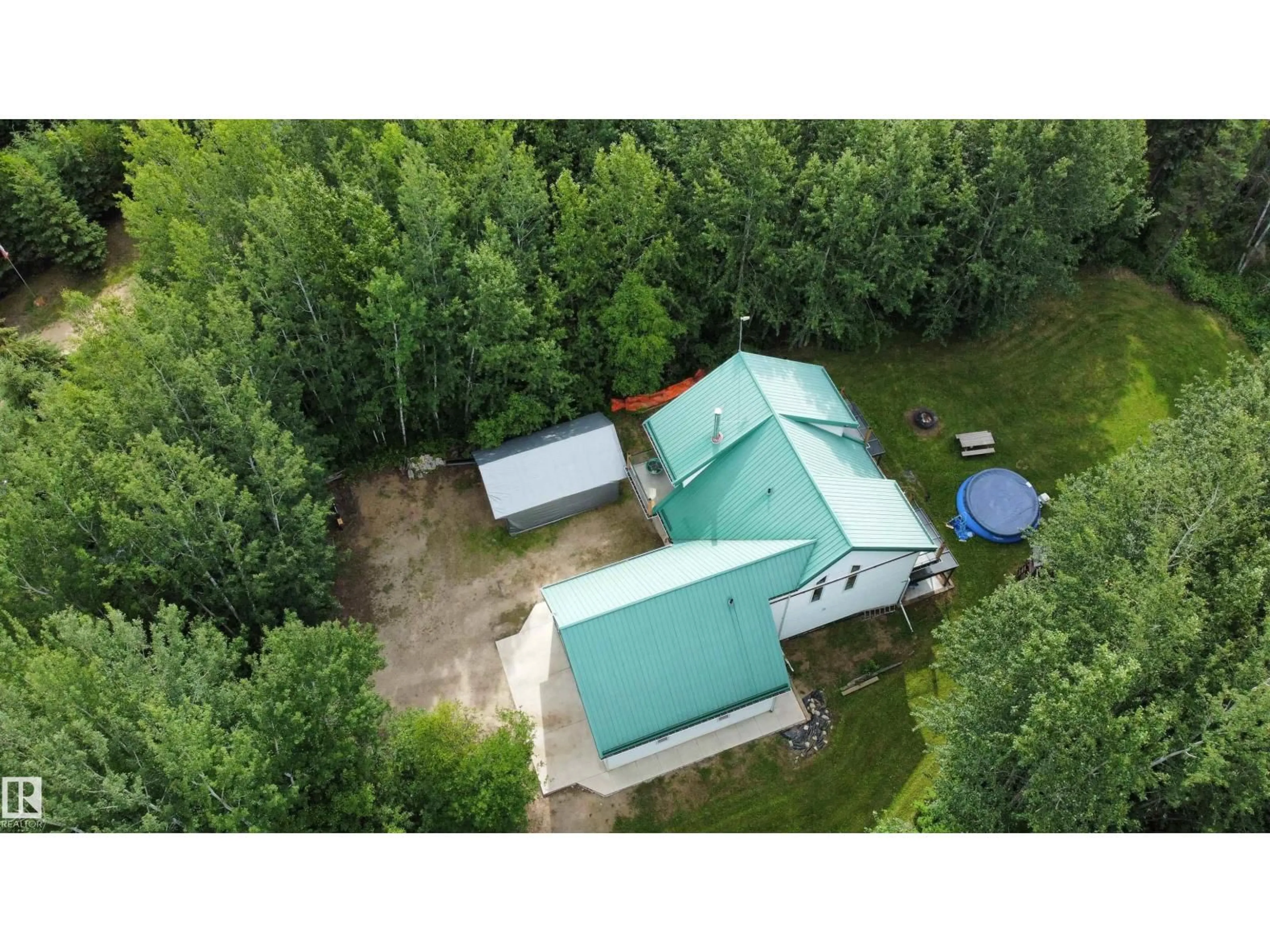 A pic from outside/outdoor area/front of a property/back of a property/a pic from drone, forest/trees view for 183049 - 66 HWY 663, Rural Athabasca County Alberta T0A0M0