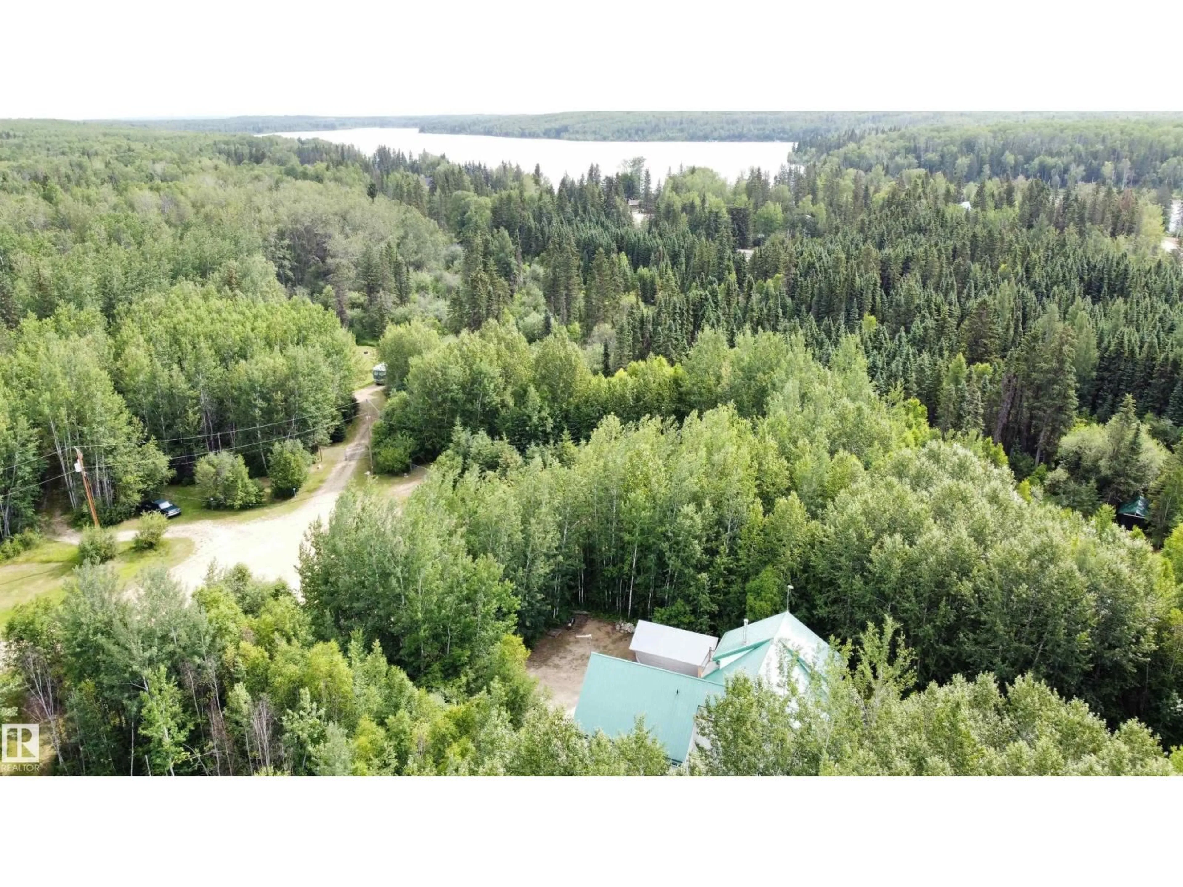A pic from outside/outdoor area/front of a property/back of a property/a pic from drone, water/lake/river/ocean view for 183049 - 66 HWY 663, Rural Athabasca County Alberta T0A0M0