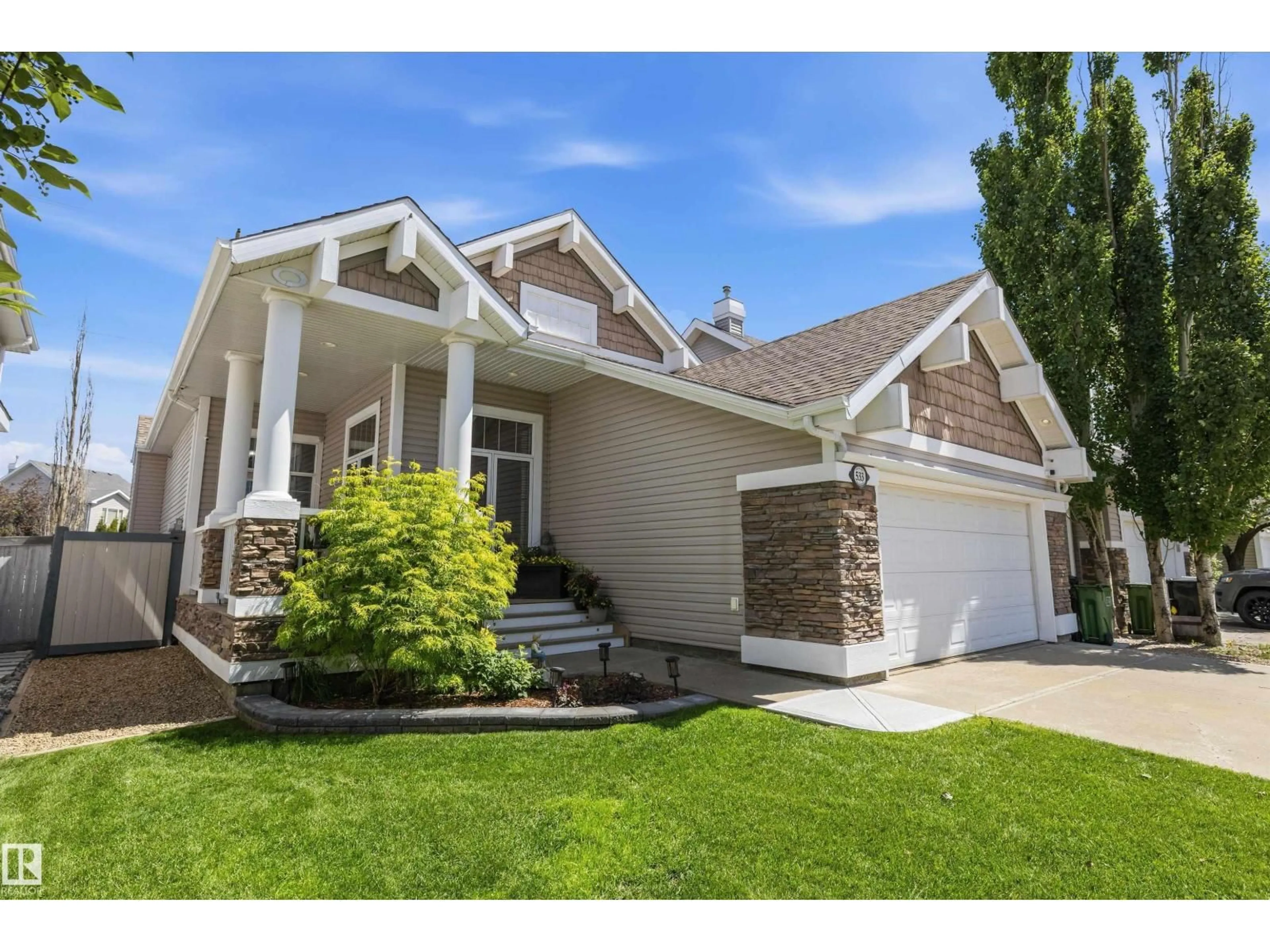 Home with vinyl exterior material, street for 533 STEWART CR, Edmonton Alberta T6X0A8