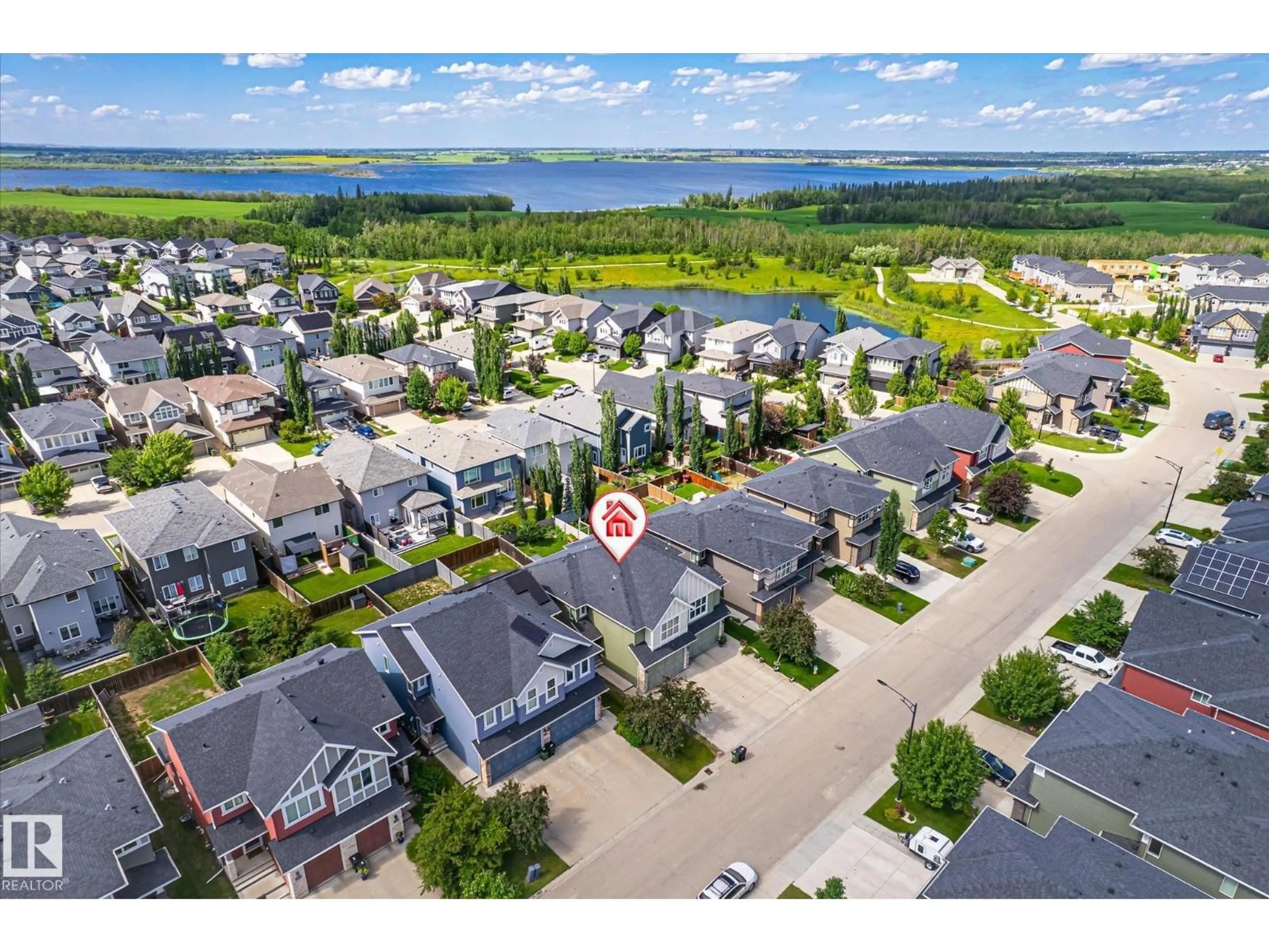 A pic from outside/outdoor area/front of a property/back of a property/a pic from drone, water/lake/river/ocean view for NW - 13008 205 ST, Edmonton Alberta T5S0G4