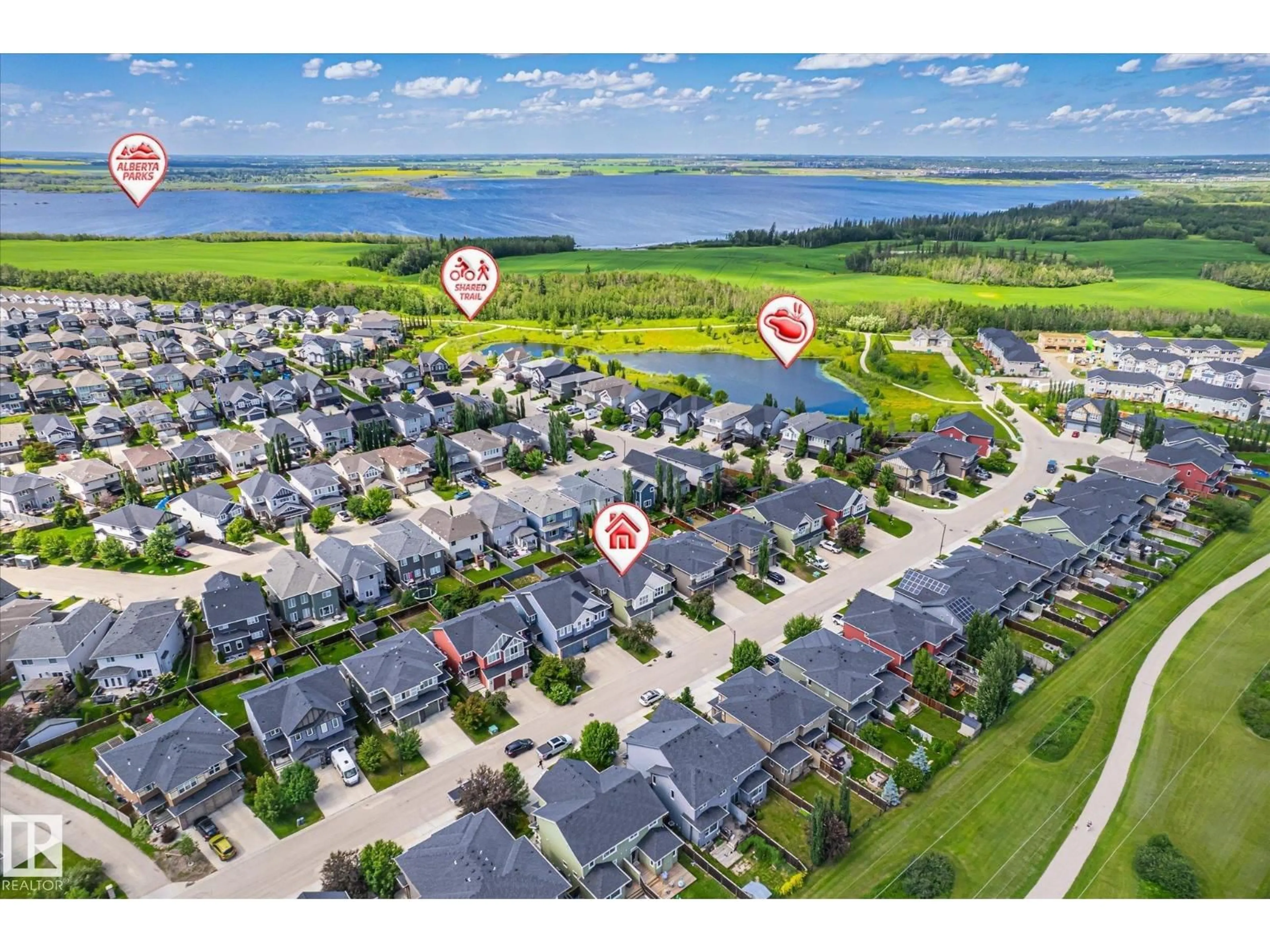 A pic from outside/outdoor area/front of a property/back of a property/a pic from drone, water/lake/river/ocean view for NW - 13008 205 ST, Edmonton Alberta T5S0G4