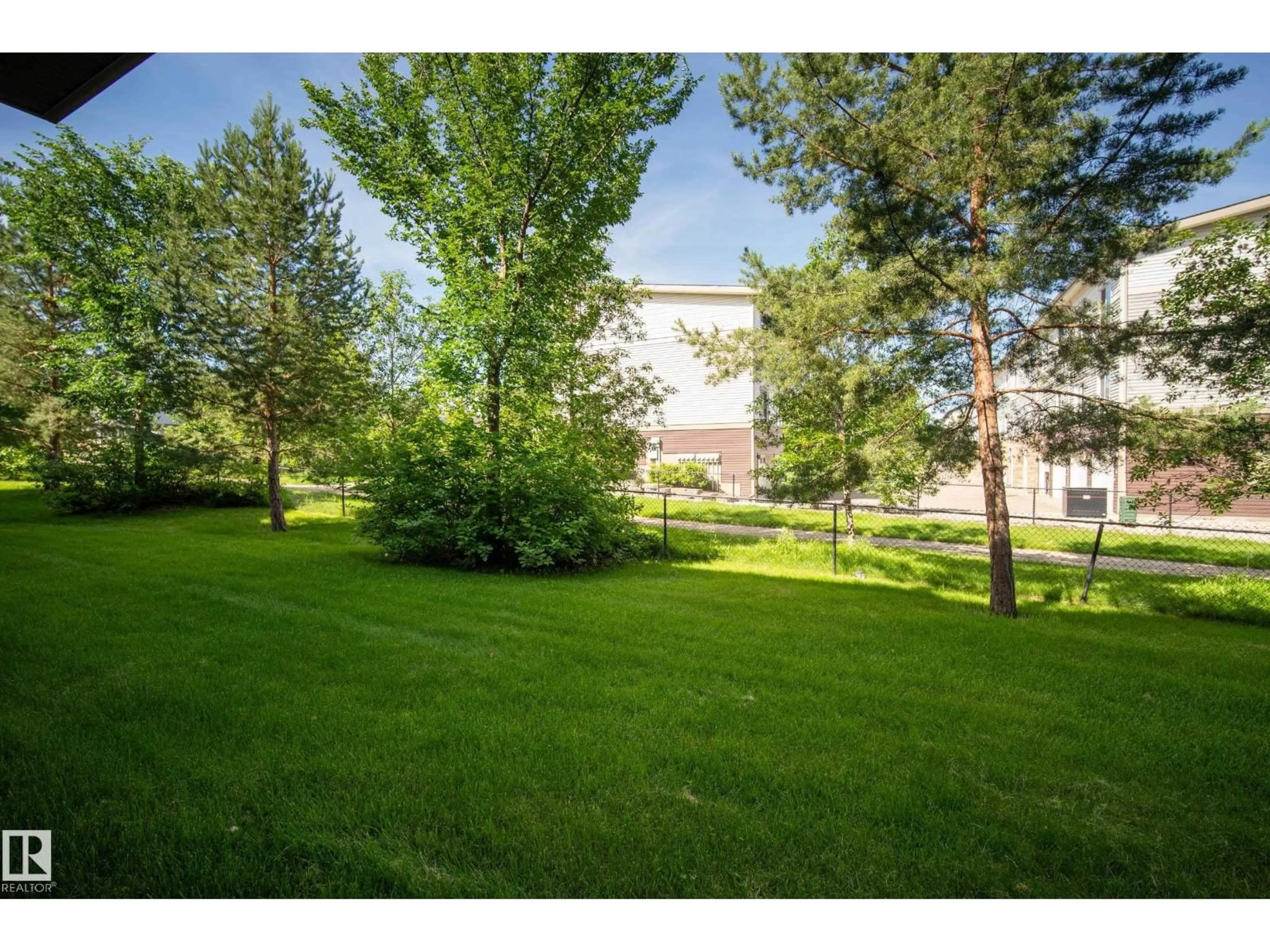 Patio, forest/trees view for 603 - 93 WATT BV, Edmonton Alberta T6X0P3