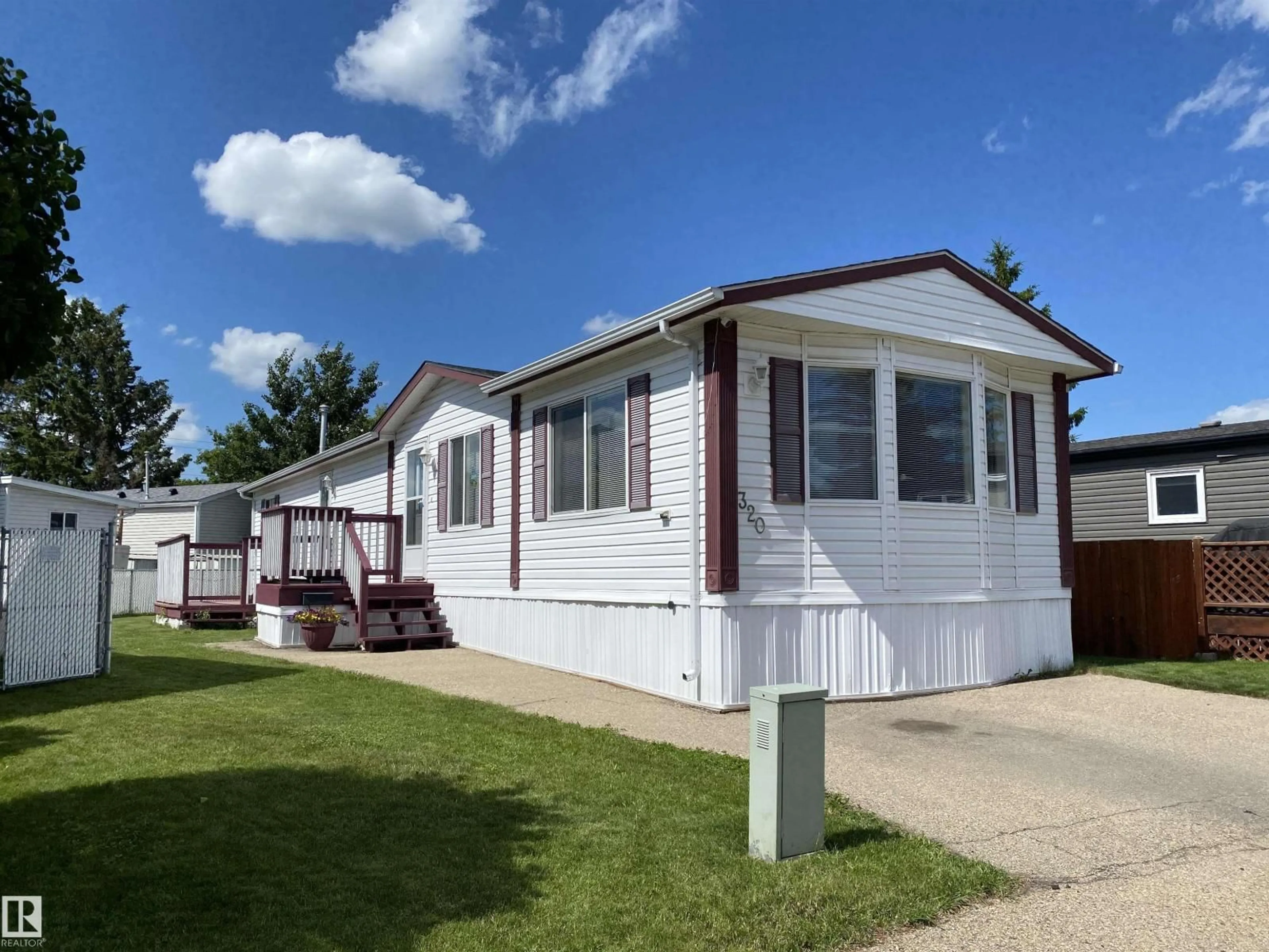 Home with vinyl exterior material, street for 320 EVERGREEN PA, Edmonton Alberta T5Y4M2
