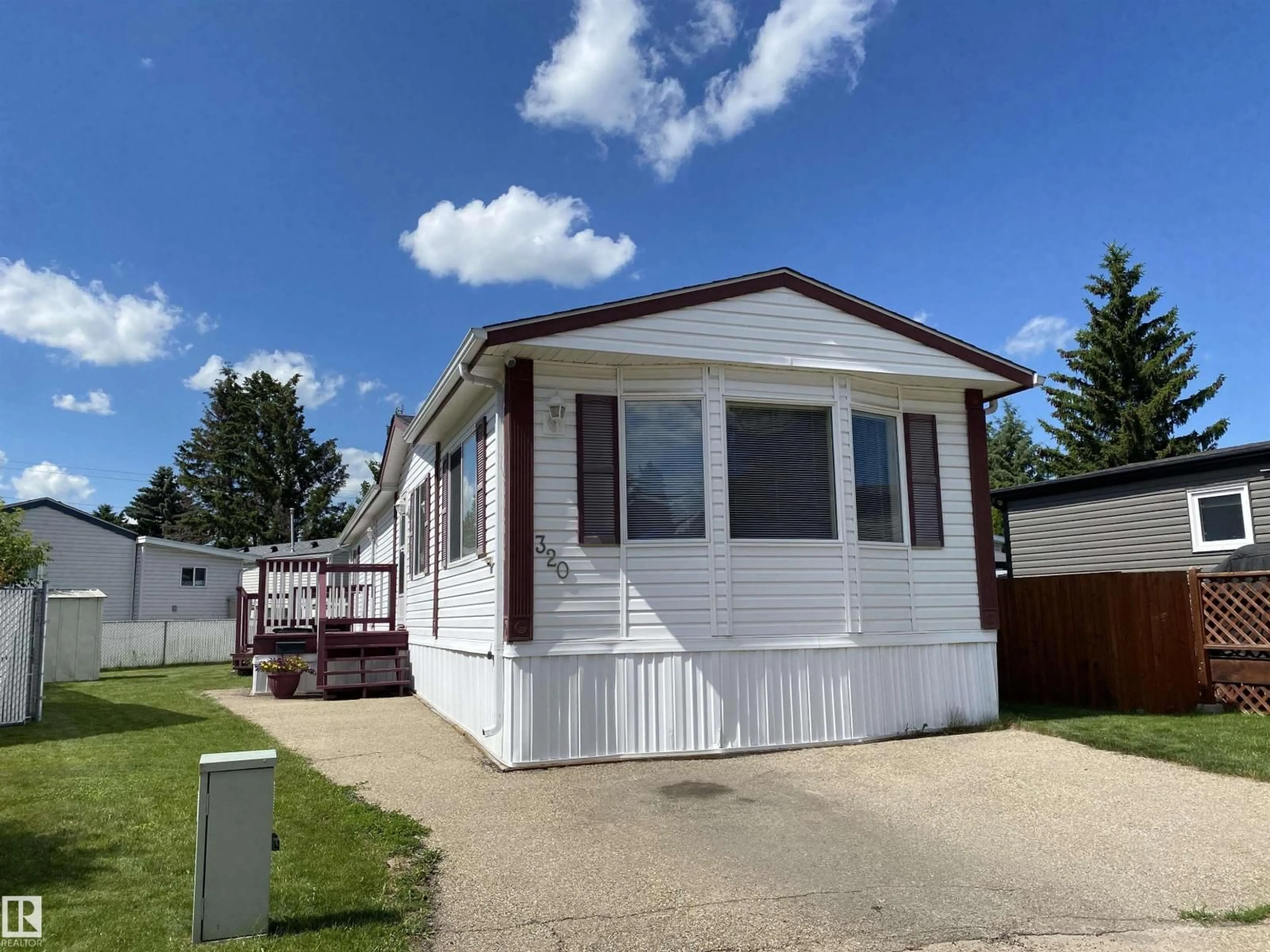 Home with vinyl exterior material, street for 320 EVERGREEN PA, Edmonton Alberta T5Y4M2