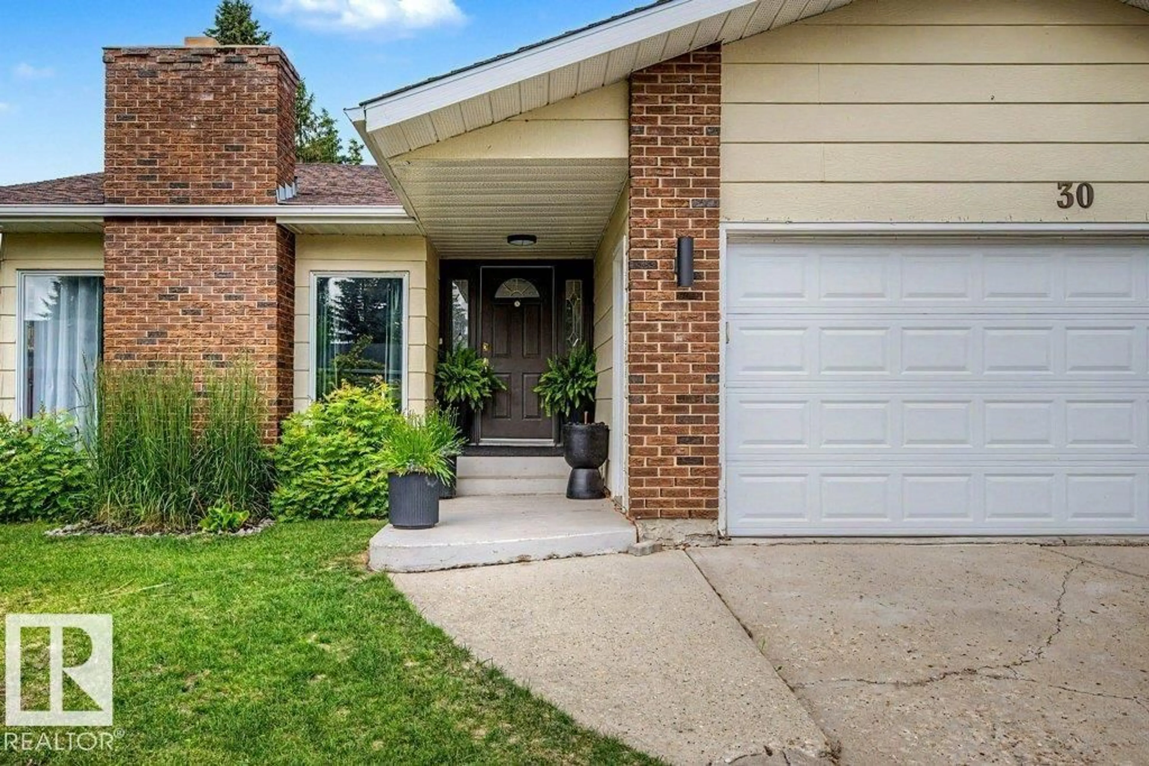 Home with brick exterior material, street for 30 ADAMIC CR, Leduc Alberta T9E5H9