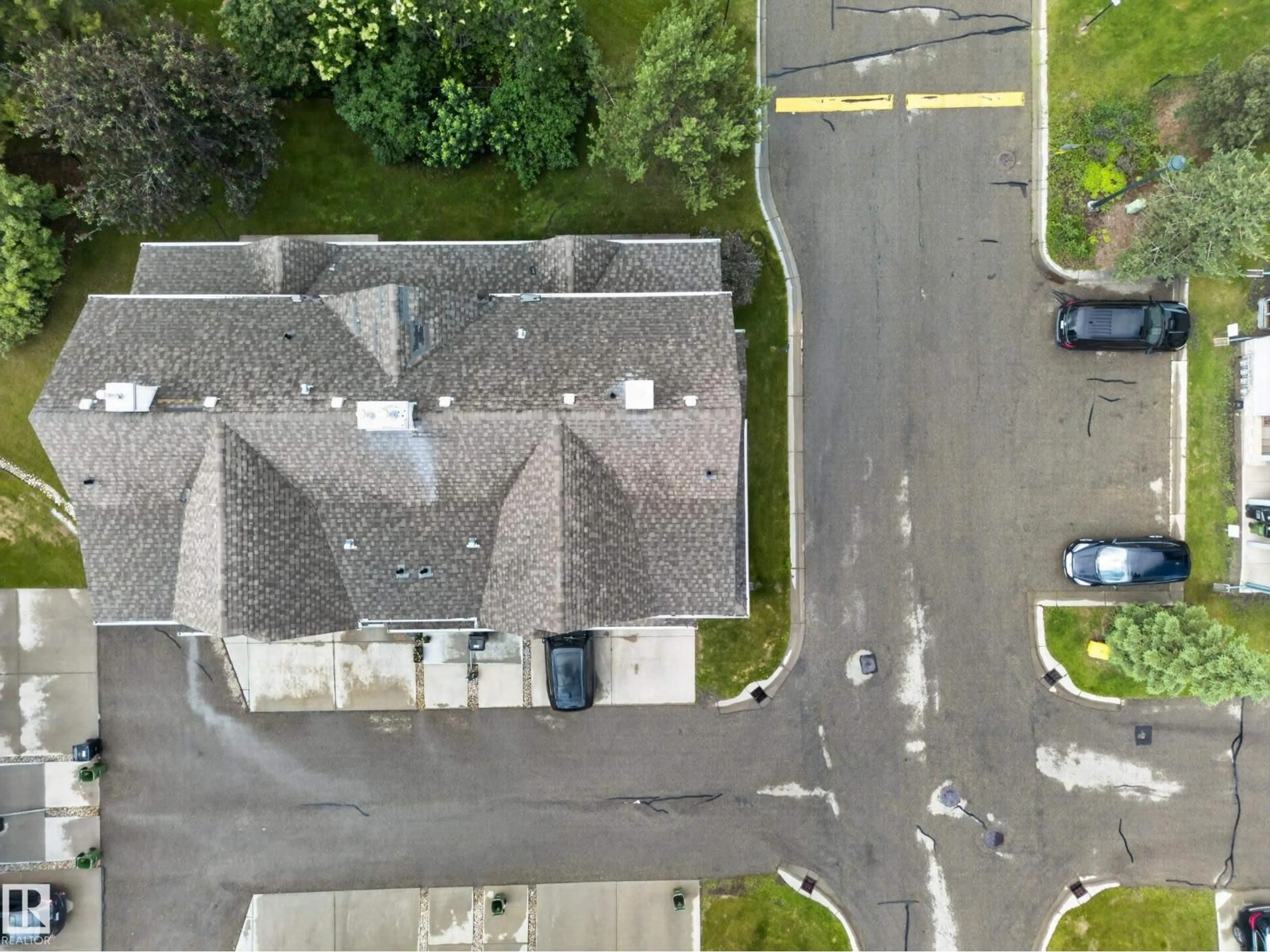 A pic from outside/outdoor area/front of a property/back of a property/a pic from drone, street for #32 - 12050 17 AV, Edmonton Alberta T6W1X4