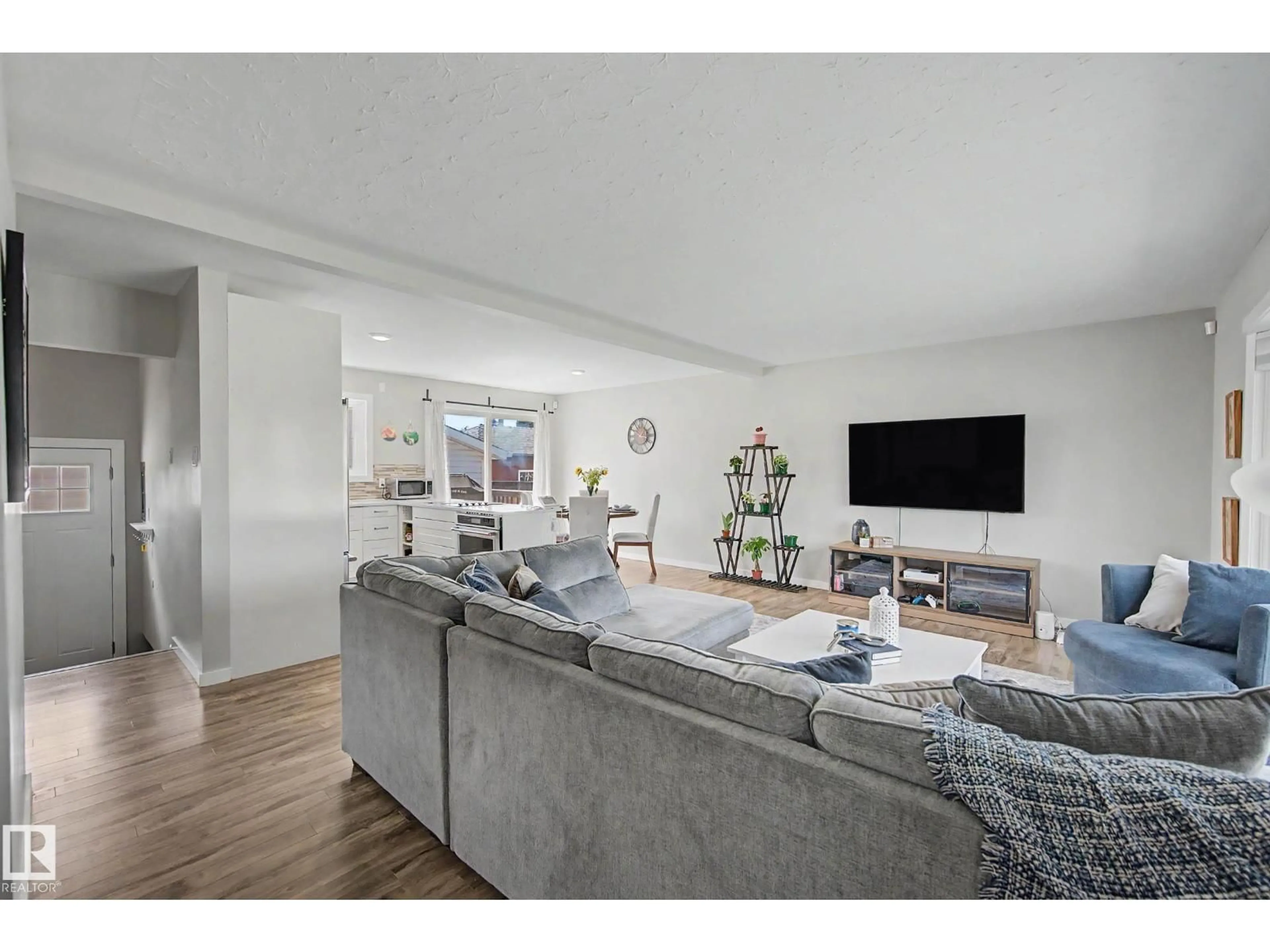 Living room with furniture, unknown for 5407 106 AV, Edmonton Alberta T6A1G1