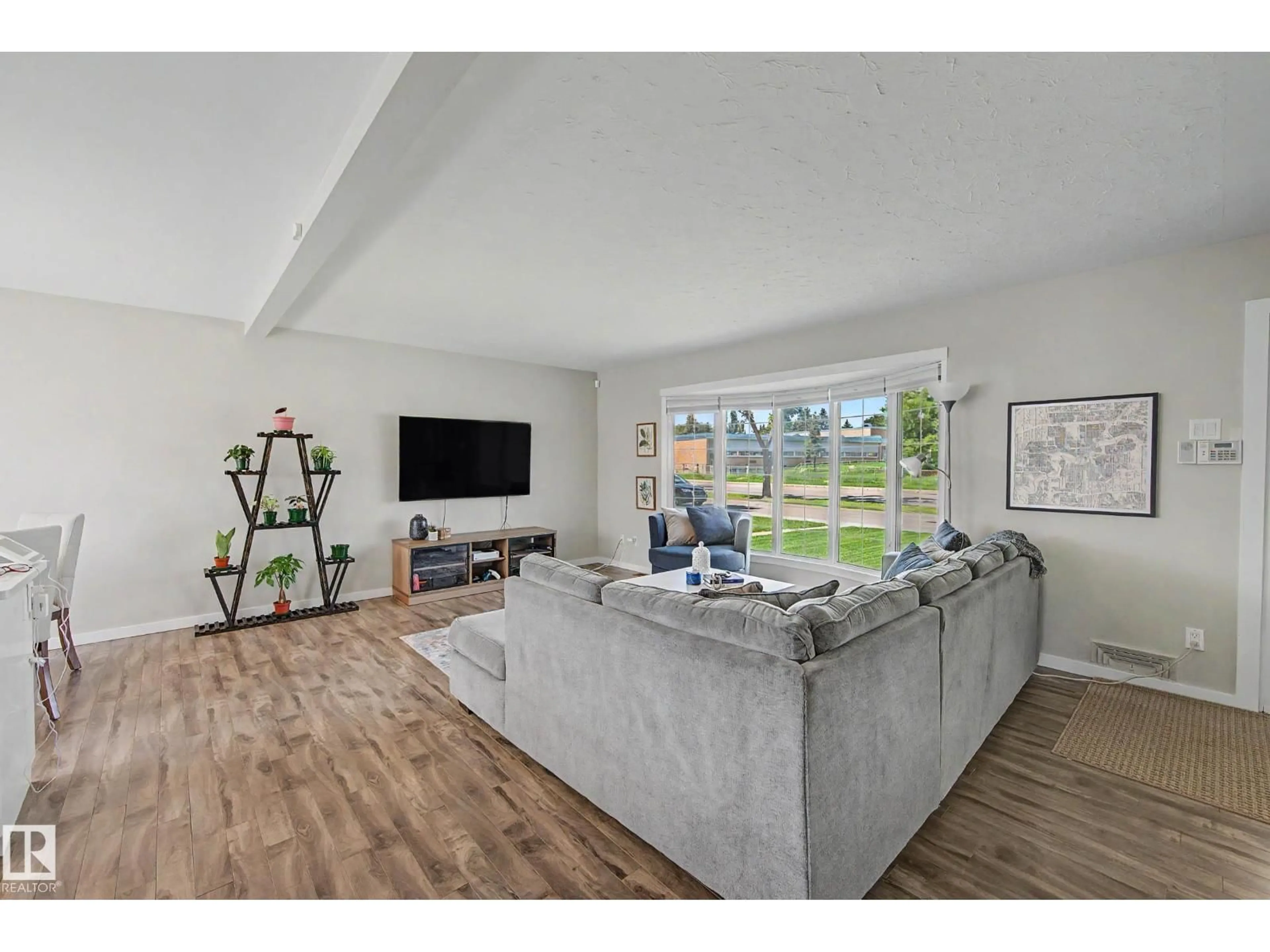 Living room with furniture, unknown for 5407 106 AV, Edmonton Alberta T6A1G1