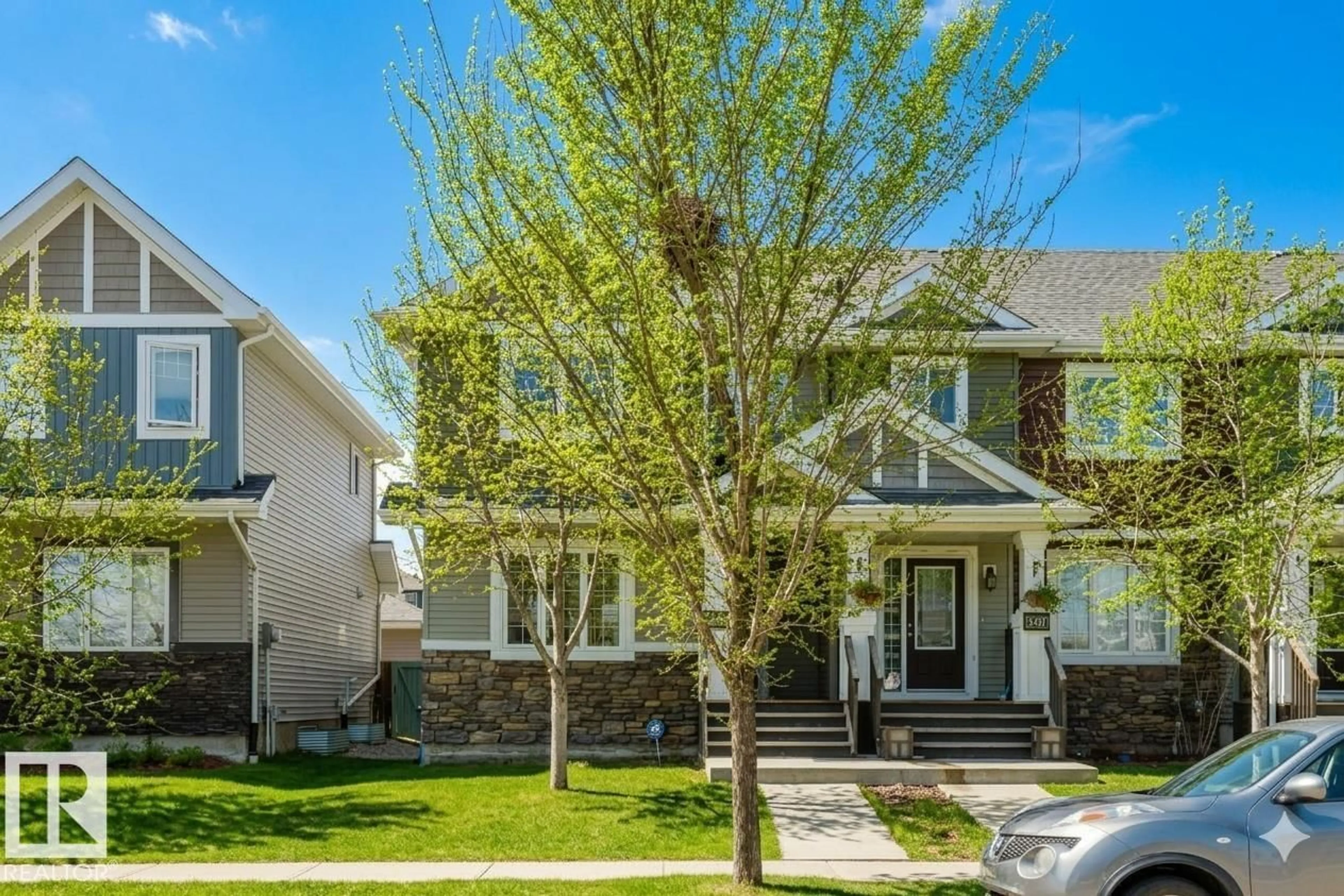 Home with vinyl exterior material, street for 2472 GLENRIDDING BV, Edmonton Alberta T6W3C5