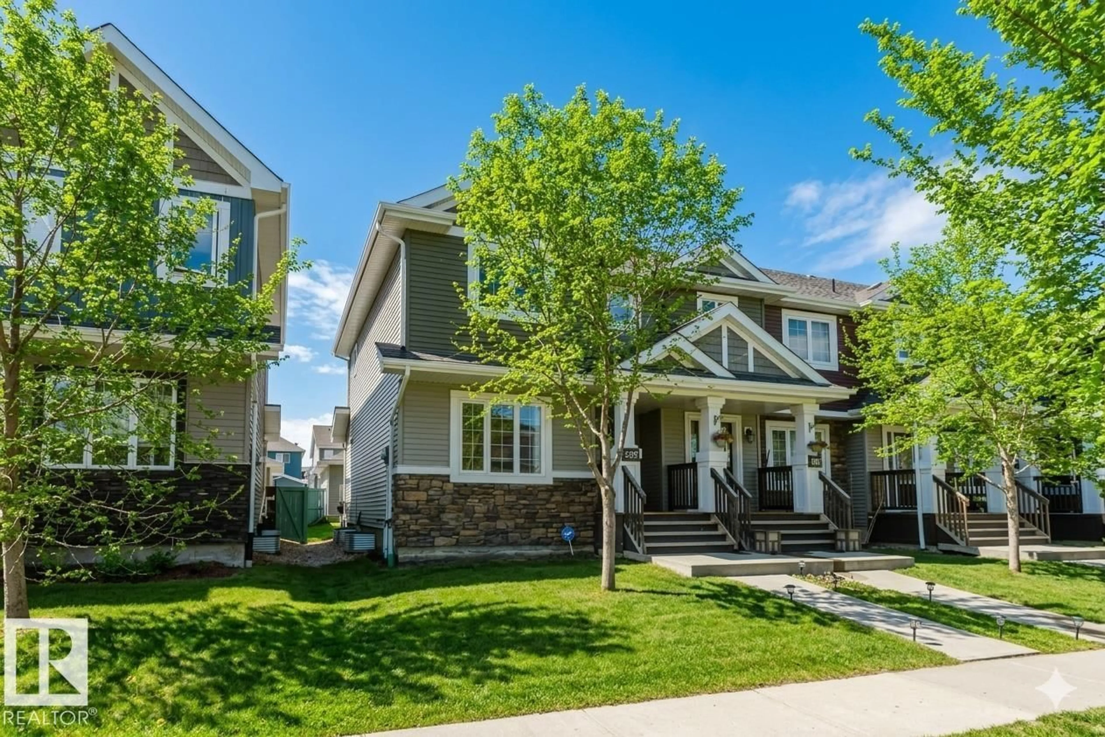 Home with vinyl exterior material, street for 2472 GLENRIDDING BV, Edmonton Alberta T6W3C5