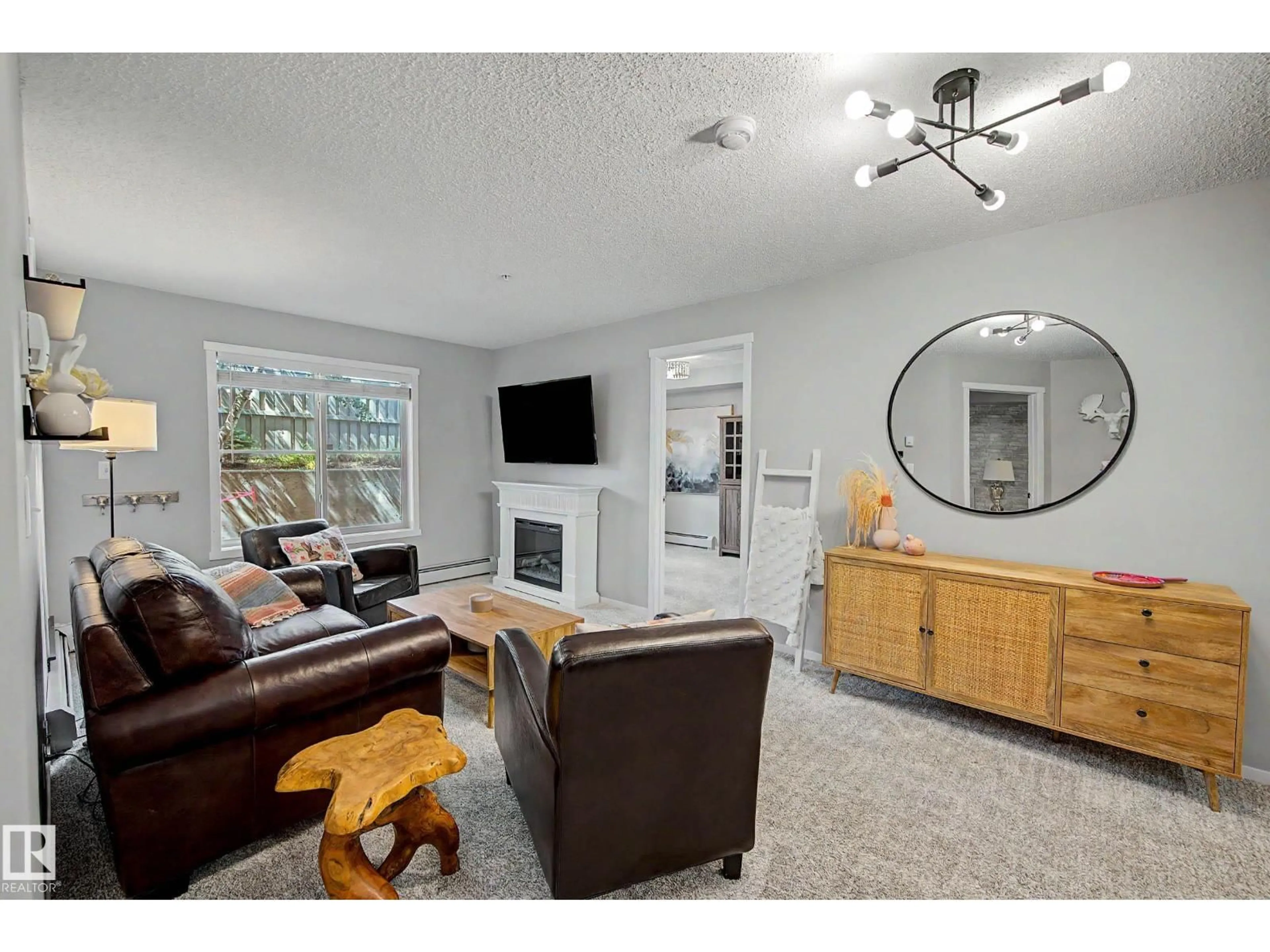 Living room with furniture, unknown for 105 - 5390 CHAPPELLE RD, Edmonton Alberta T6W3K7
