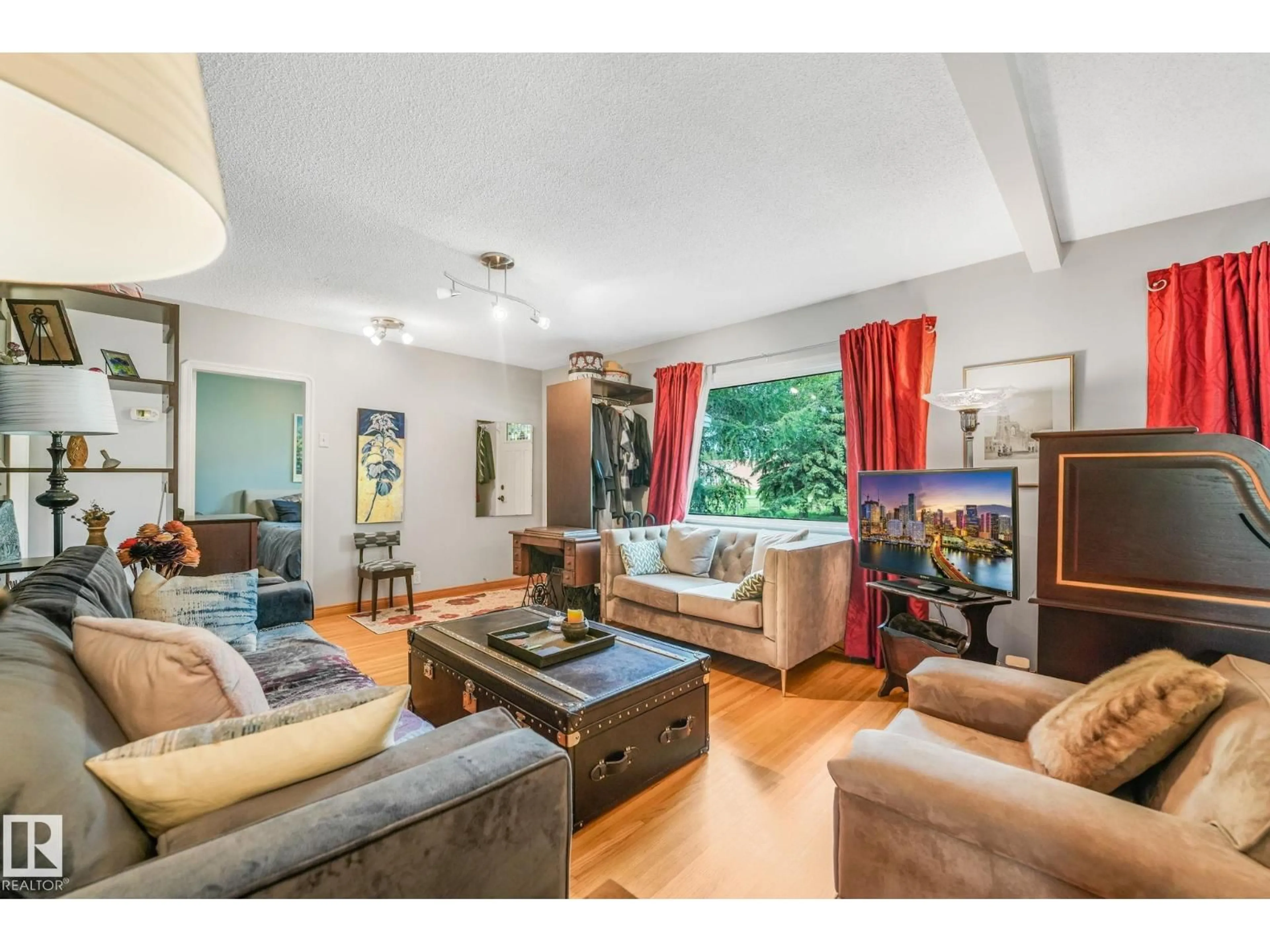 Living room with furniture, unknown for NW - 11422 70 ST, Edmonton Alberta T5B1T4