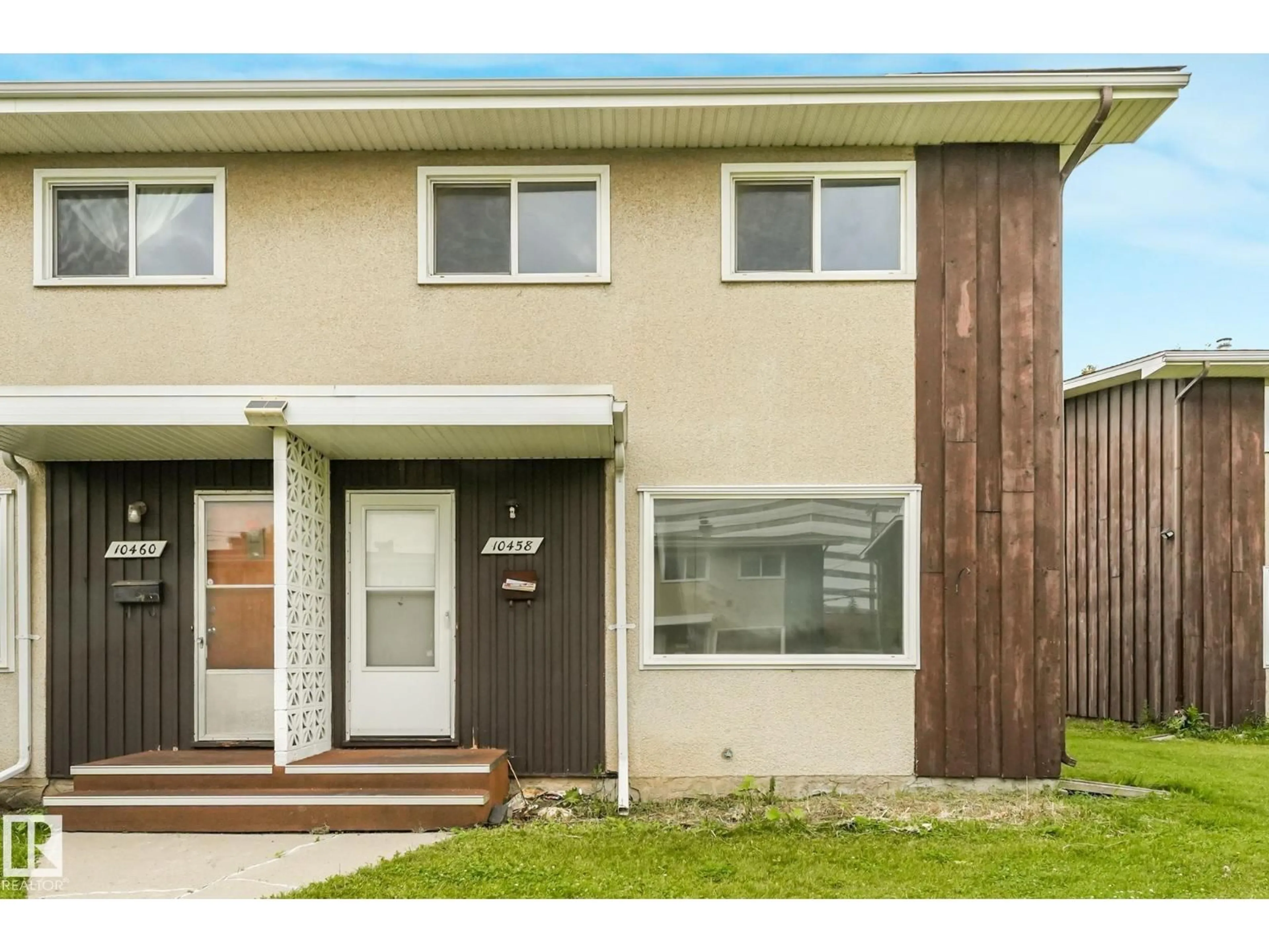 Home with vinyl exterior material, street for 10458 55 AV, Edmonton Alberta T6H0W6