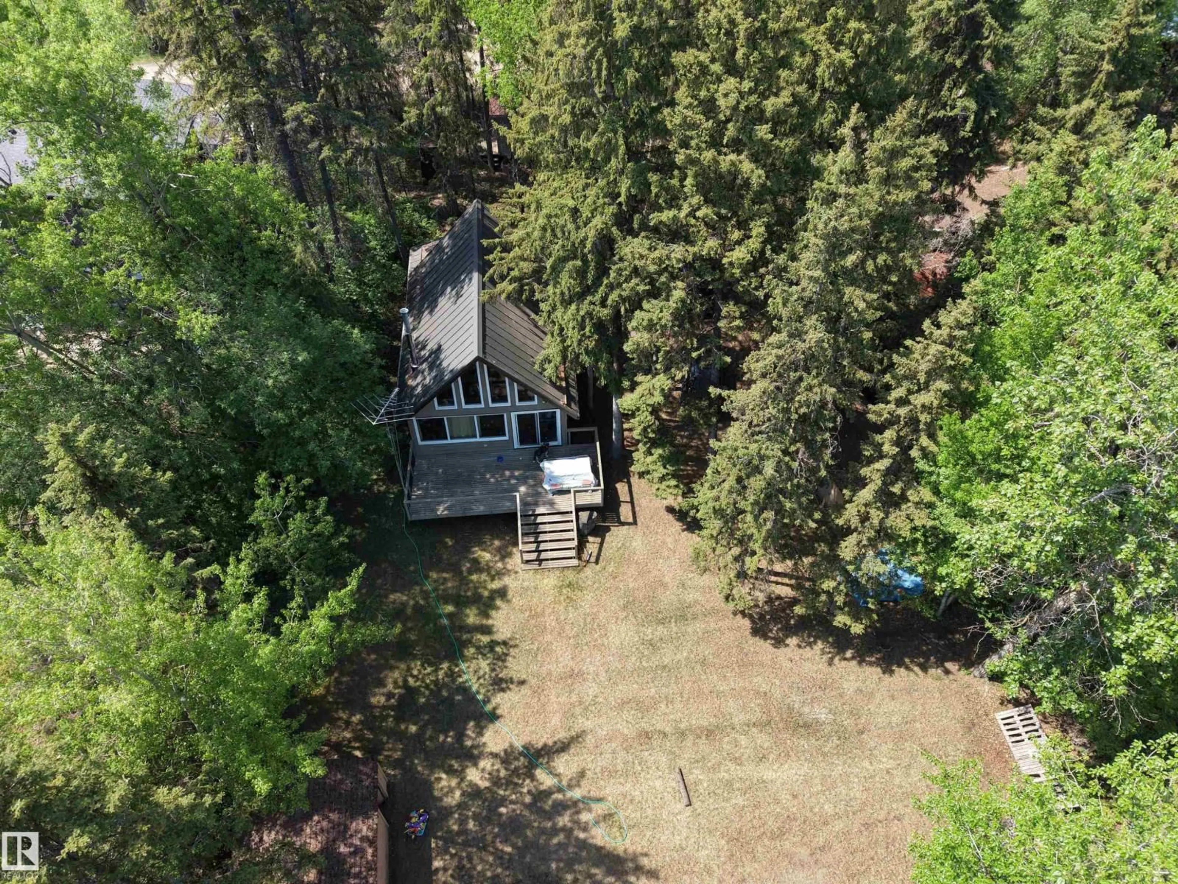 A pic from outside/outdoor area/front of a property/back of a property/a pic from drone, forest/trees view for 4307 SPRUCE PT, Rural Lac Ste. Anne County Alberta T0E1V0