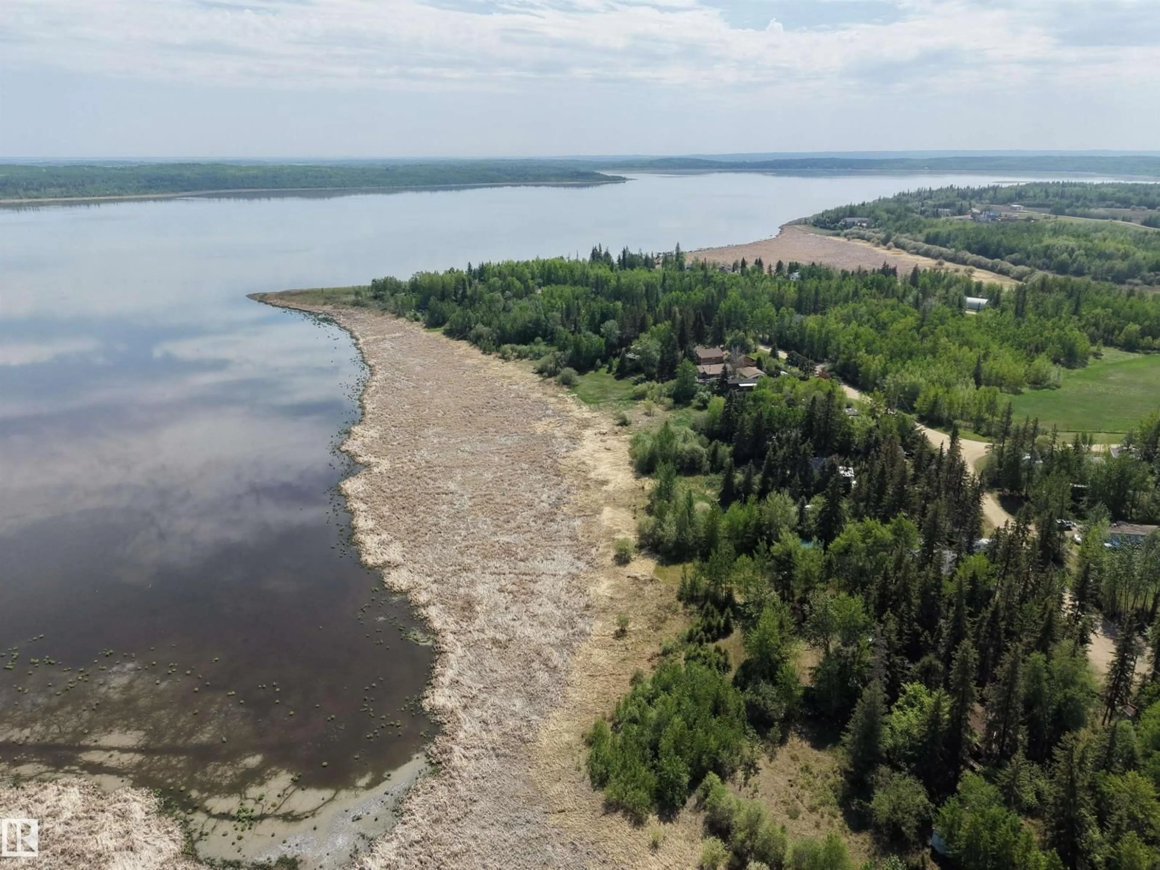 A pic from outside/outdoor area/front of a property/back of a property/a pic from drone, water/lake/river/ocean view for 4307 SPRUCE PT, Rural Lac Ste. Anne County Alberta T0E1V0
