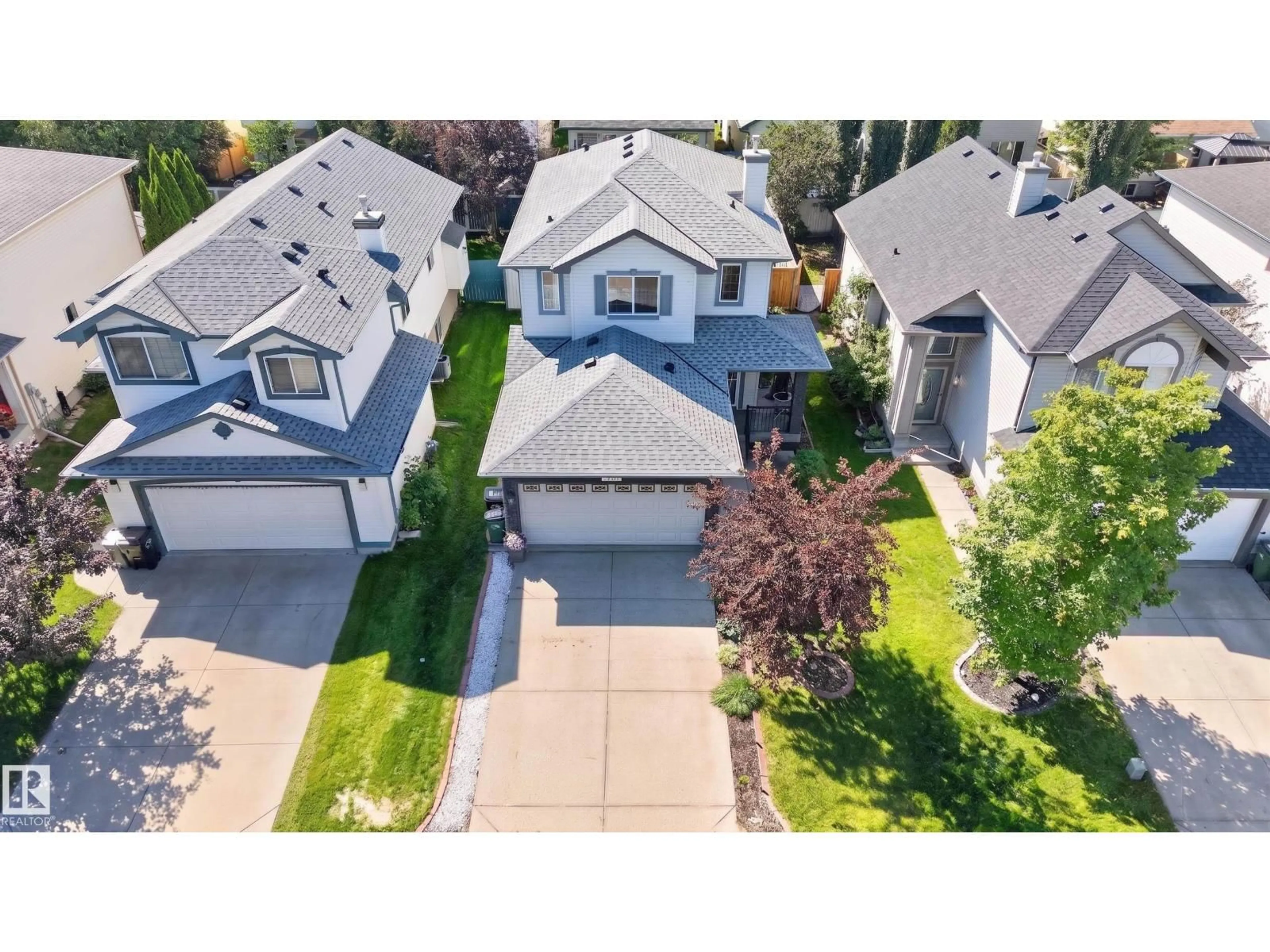 A pic from outside/outdoor area/front of a property/back of a property/a pic from drone, street for 2327 37B AV, Edmonton Alberta T6T1N8