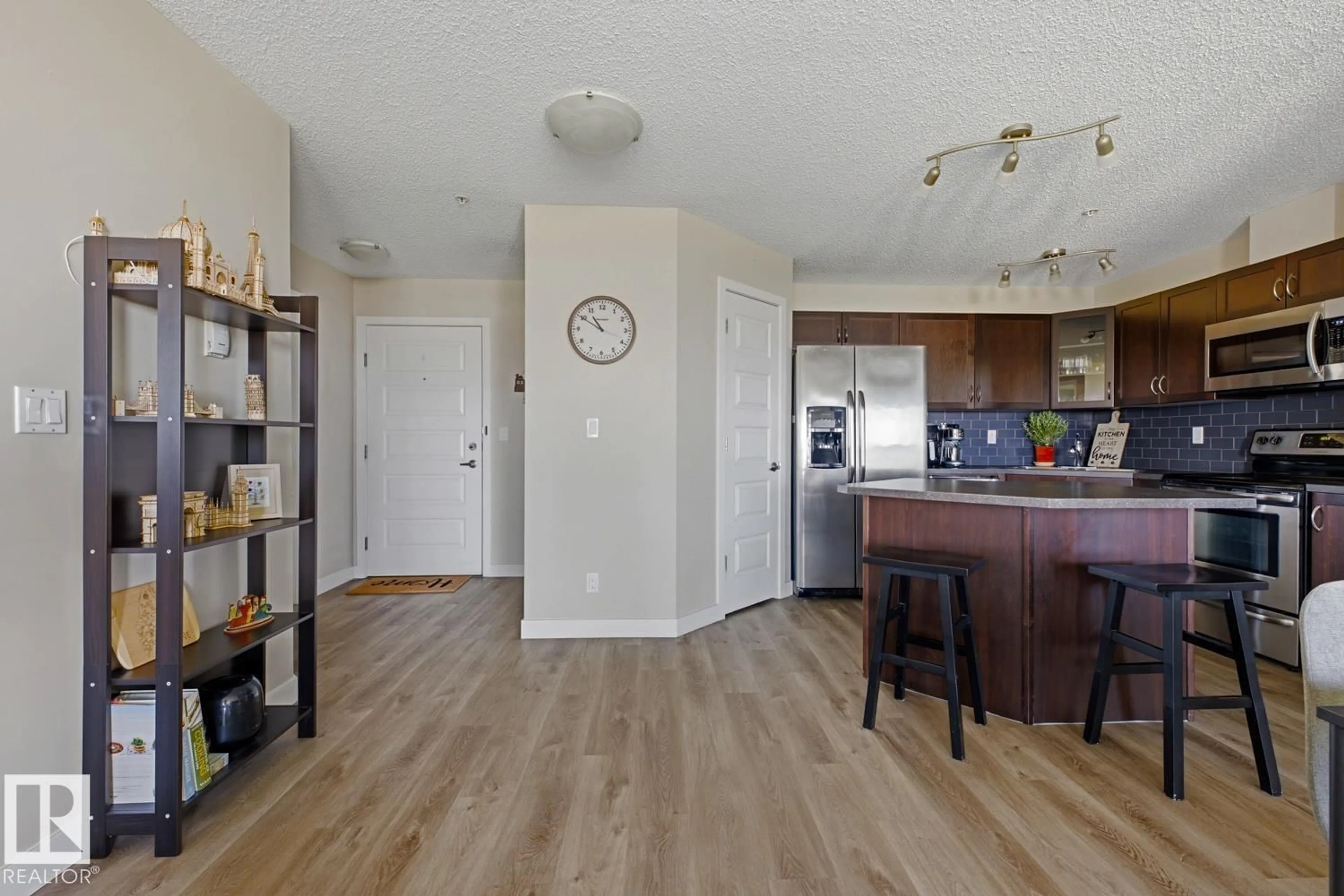 Open concept kitchen, wood/laminate floor for 400 - 317 SILVER BERRY RD, Edmonton Alberta T6T0H1