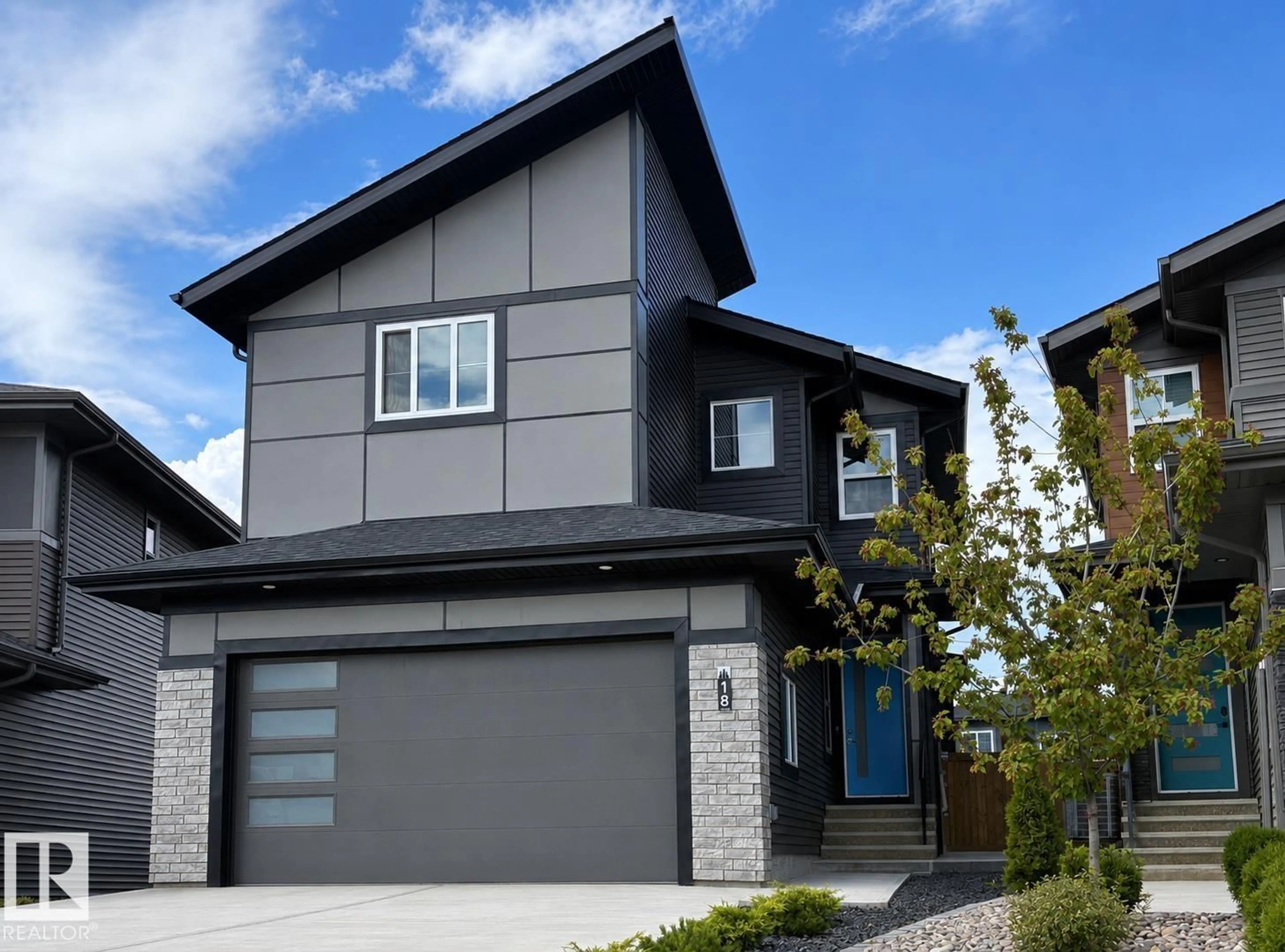 Home with vinyl exterior material, street for 18 KIWYCK LI, Spruce Grove Alberta T7X3G7