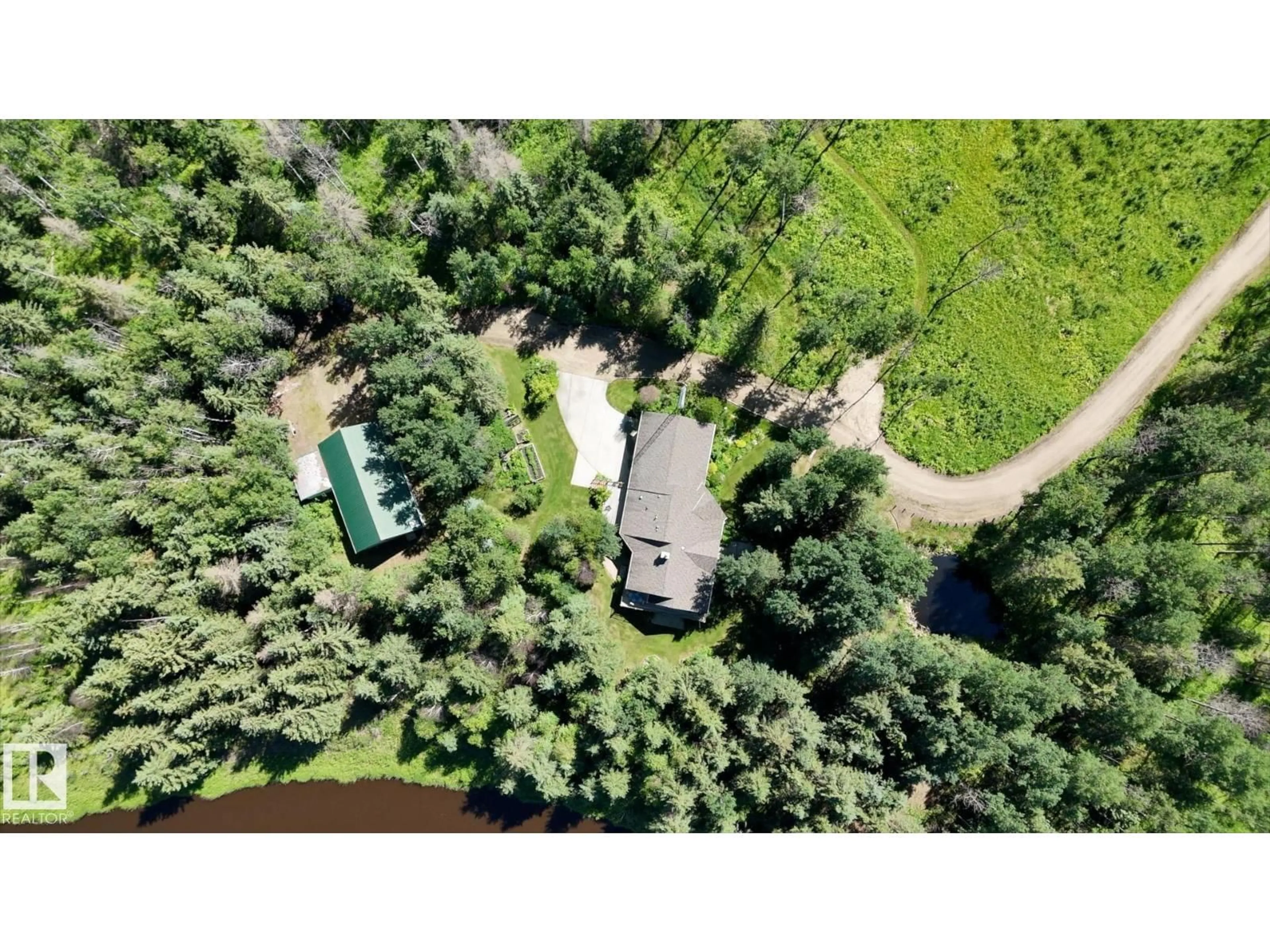 A pic from outside/outdoor area/front of a property/back of a property/a pic from drone, forest/trees view for 8316 HWY 16 A, Rural Yellowhead Alberta T0E0T0