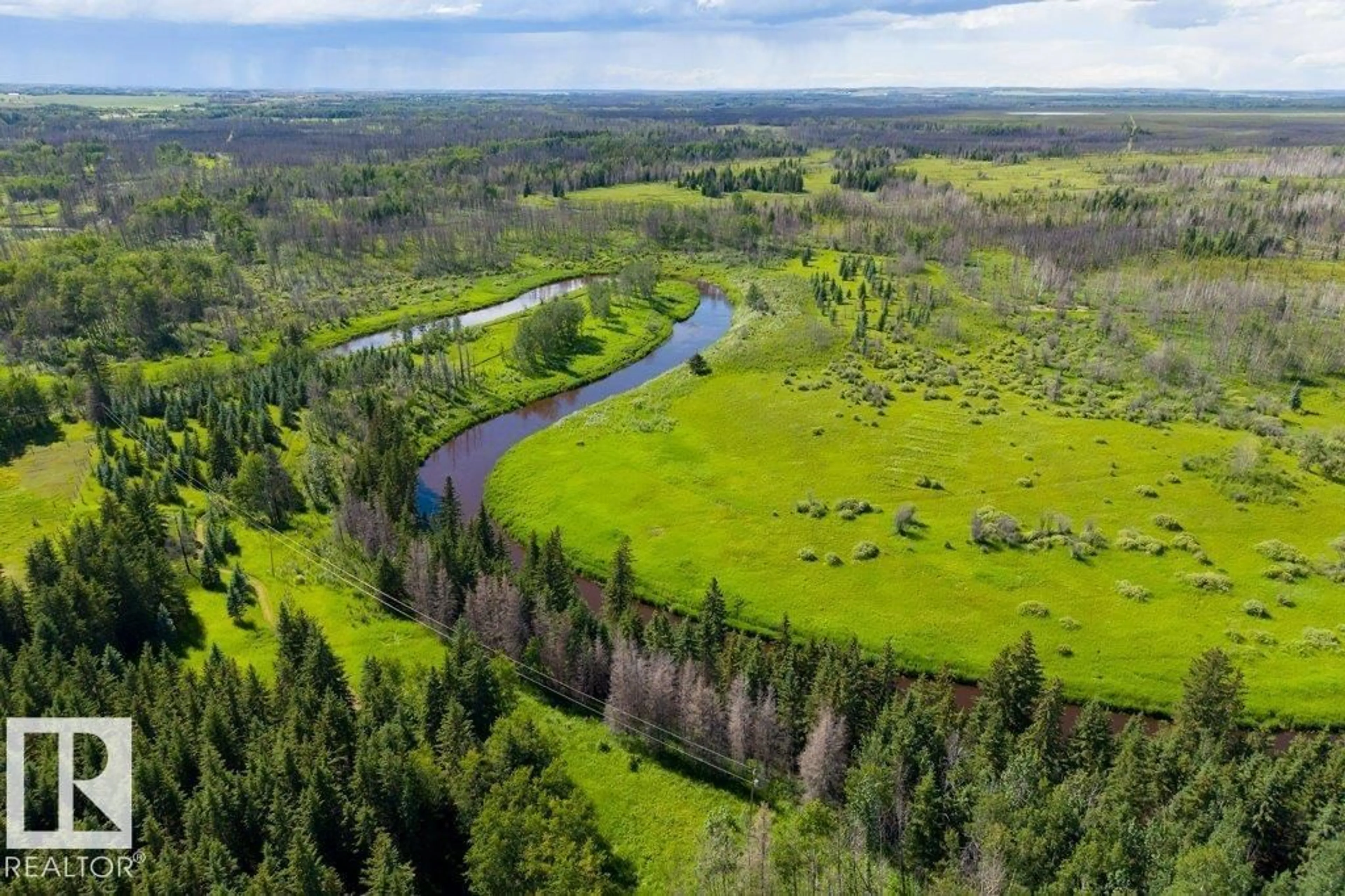 A pic from outside/outdoor area/front of a property/back of a property/a pic from drone, water/lake/river/ocean view for 8316 HWY 16 A, Rural Yellowhead Alberta T0E0T0