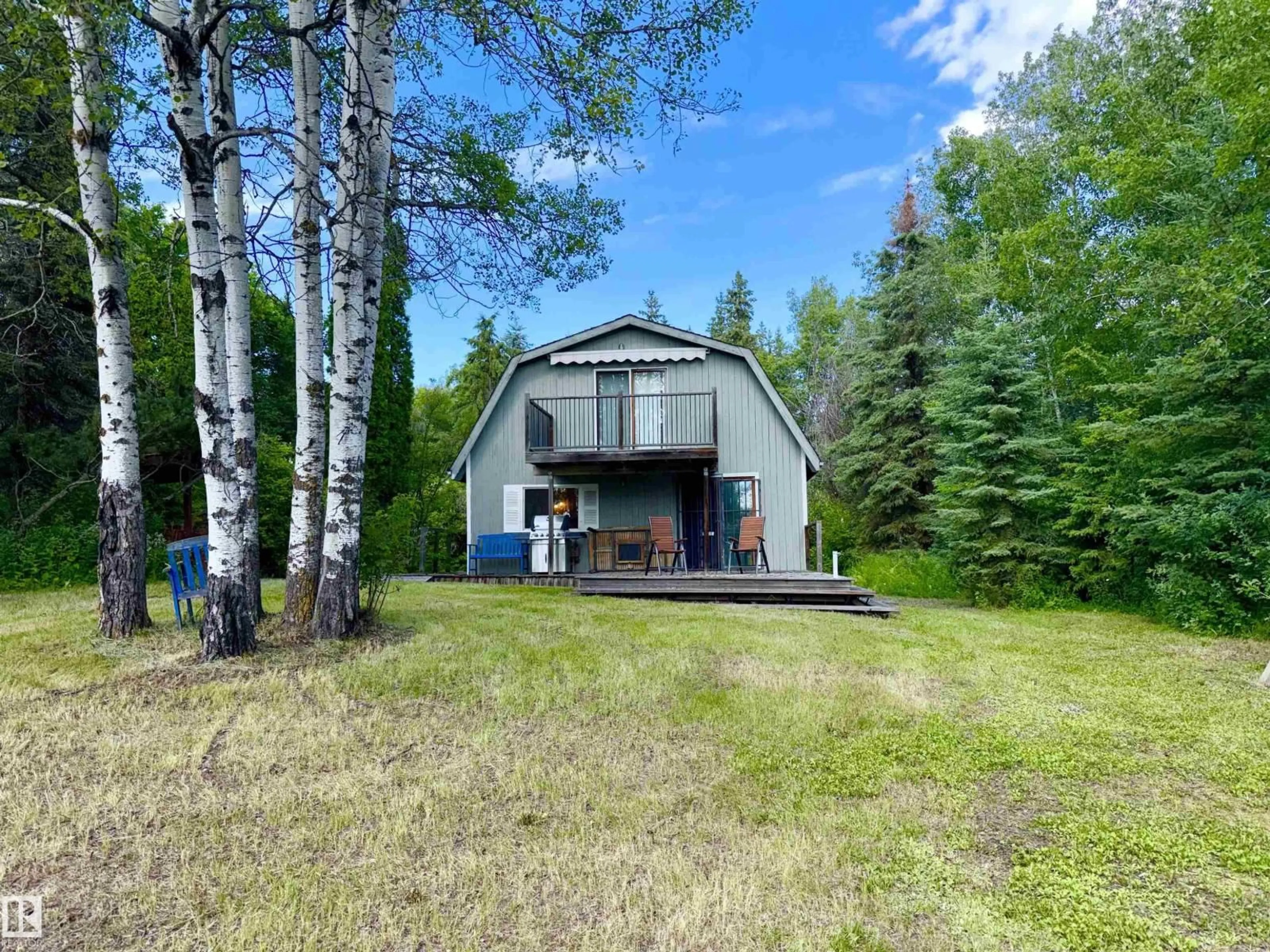 A pic from outside/outdoor area/front of a property/back of a property/a pic from drone, forest/trees view for 208 - 60118 SECONDARY HIGHWAY 867, Rural St. Paul County Alberta T0A0C0