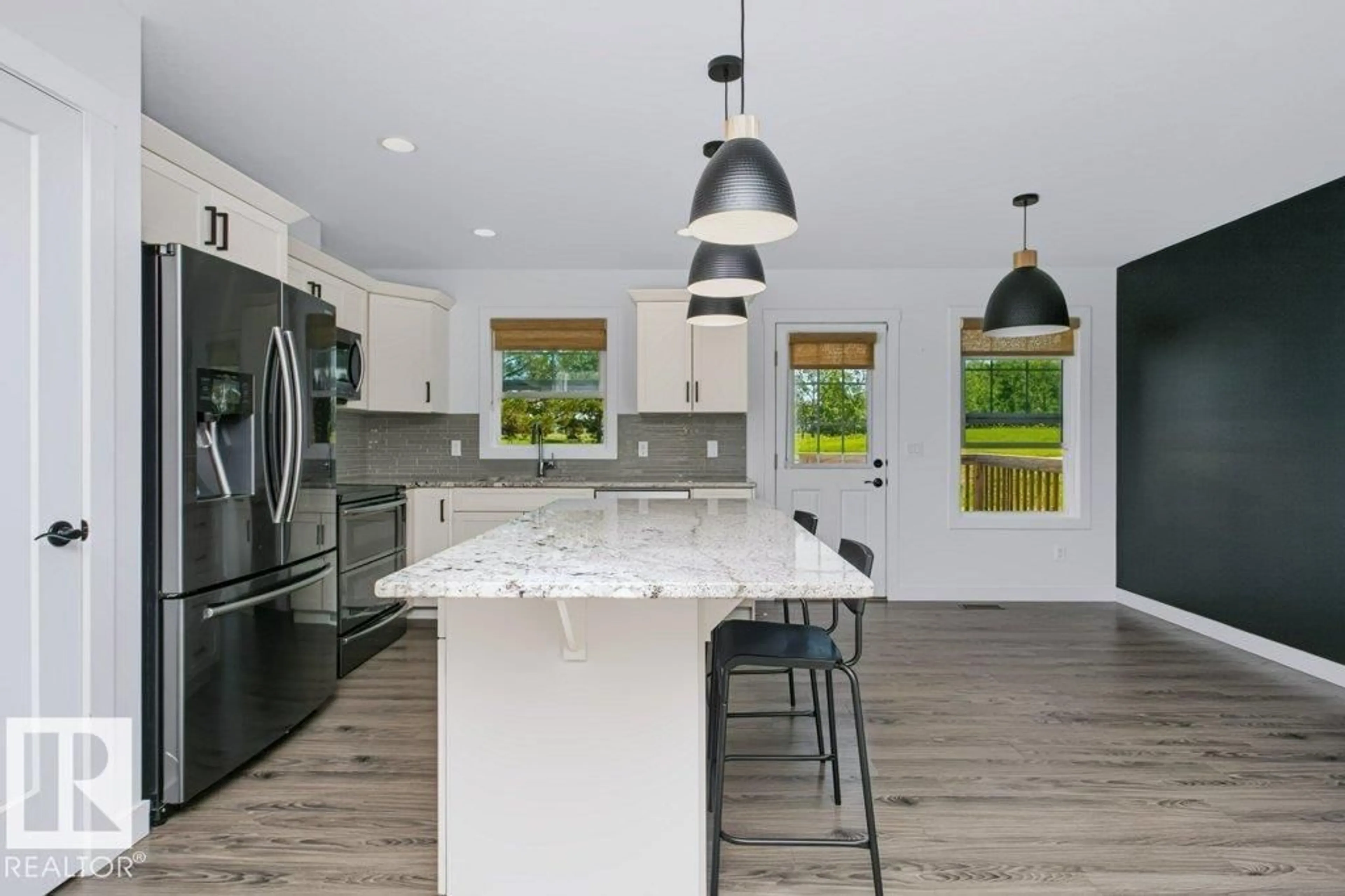 Open concept kitchen, ceramic/tile floor for 4205 - 27 30 ST, Edmonton Alberta T6T2G9