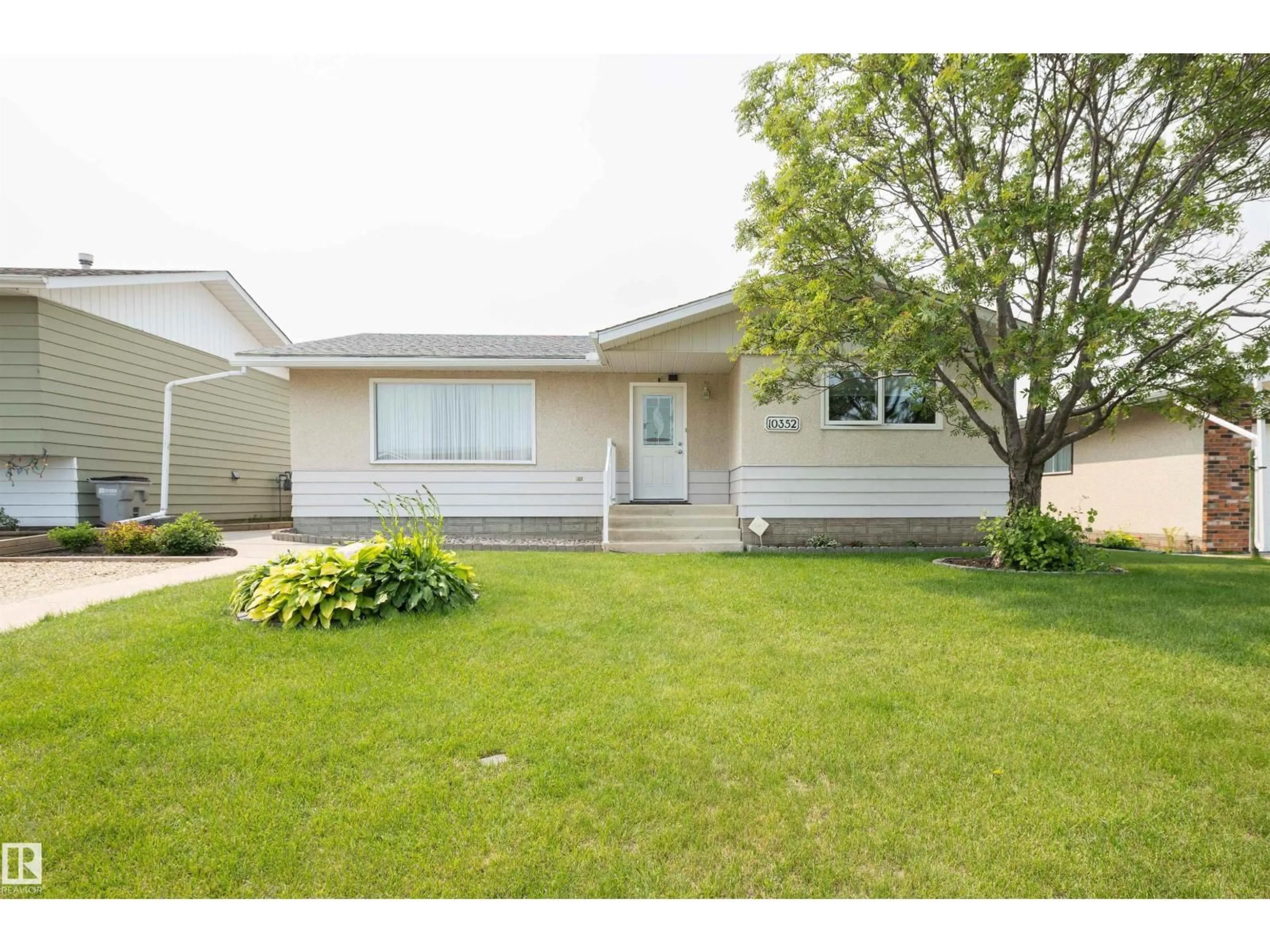 Home with vinyl exterior material, street for 10352 109 AVE, Westlock Alberta T7P1G9