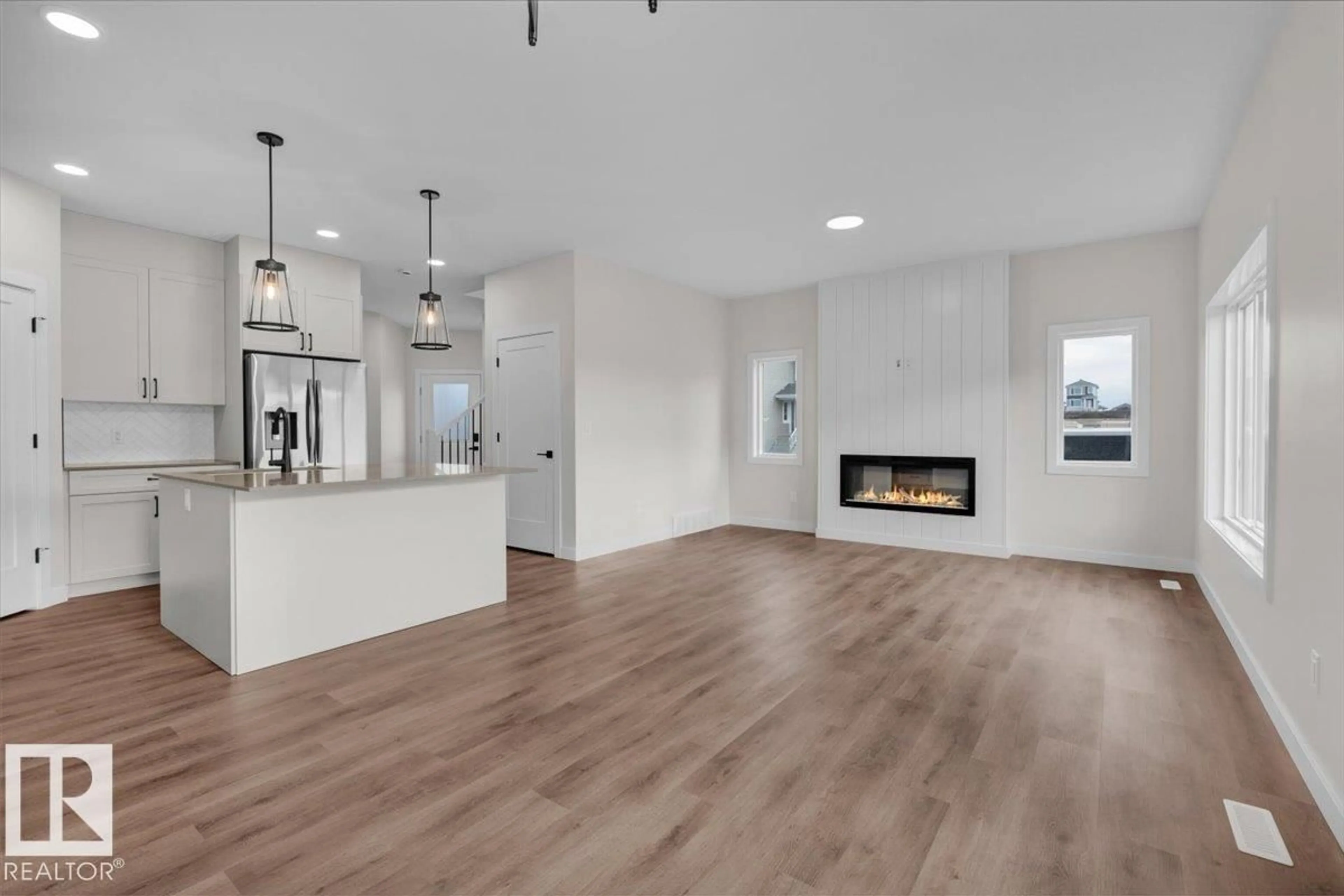 Open concept kitchen, wood/laminate floor for 1920 WESTERRA LN, Stony Plain Alberta T7Z0L3