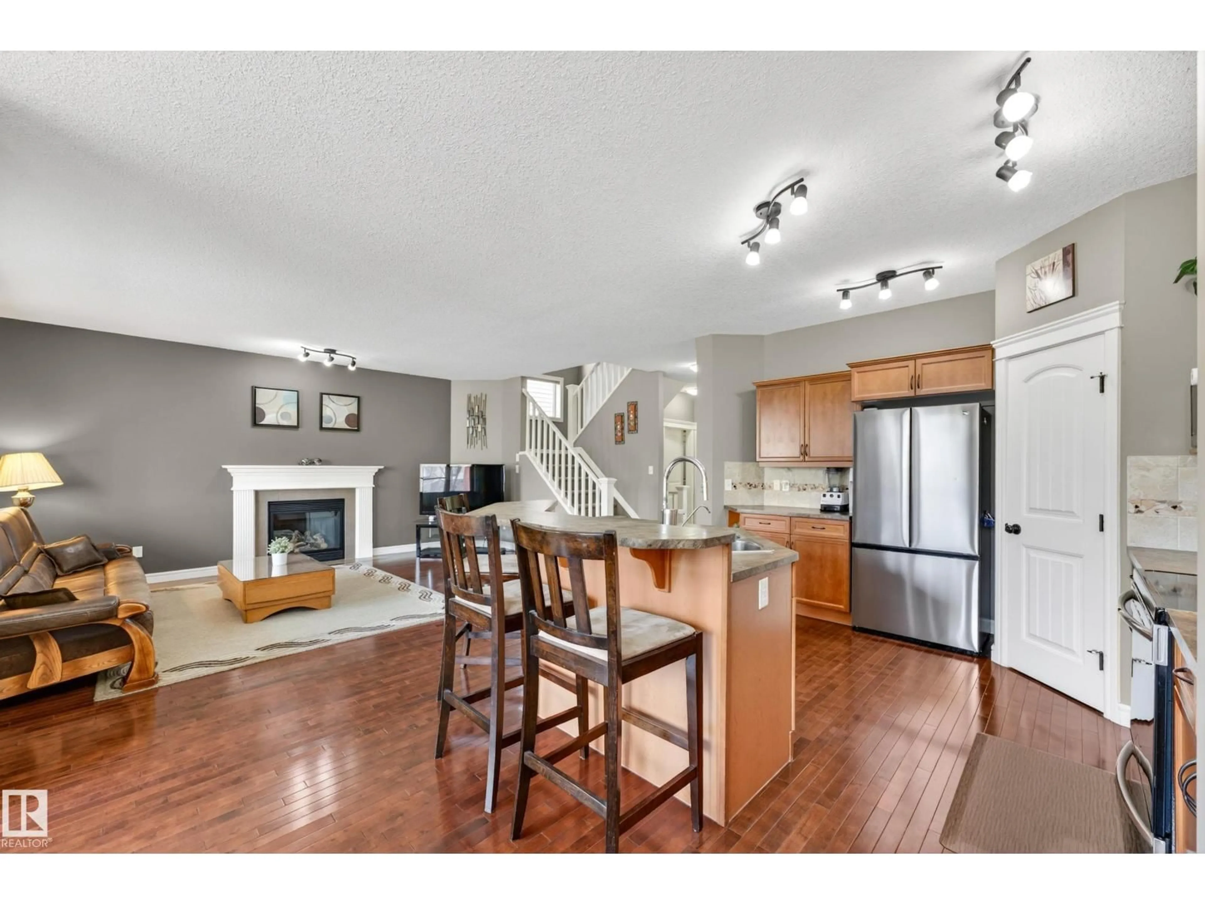 Open concept kitchen, wood/laminate floor for 506 ADAMS WY, Edmonton Alberta T6W0H1