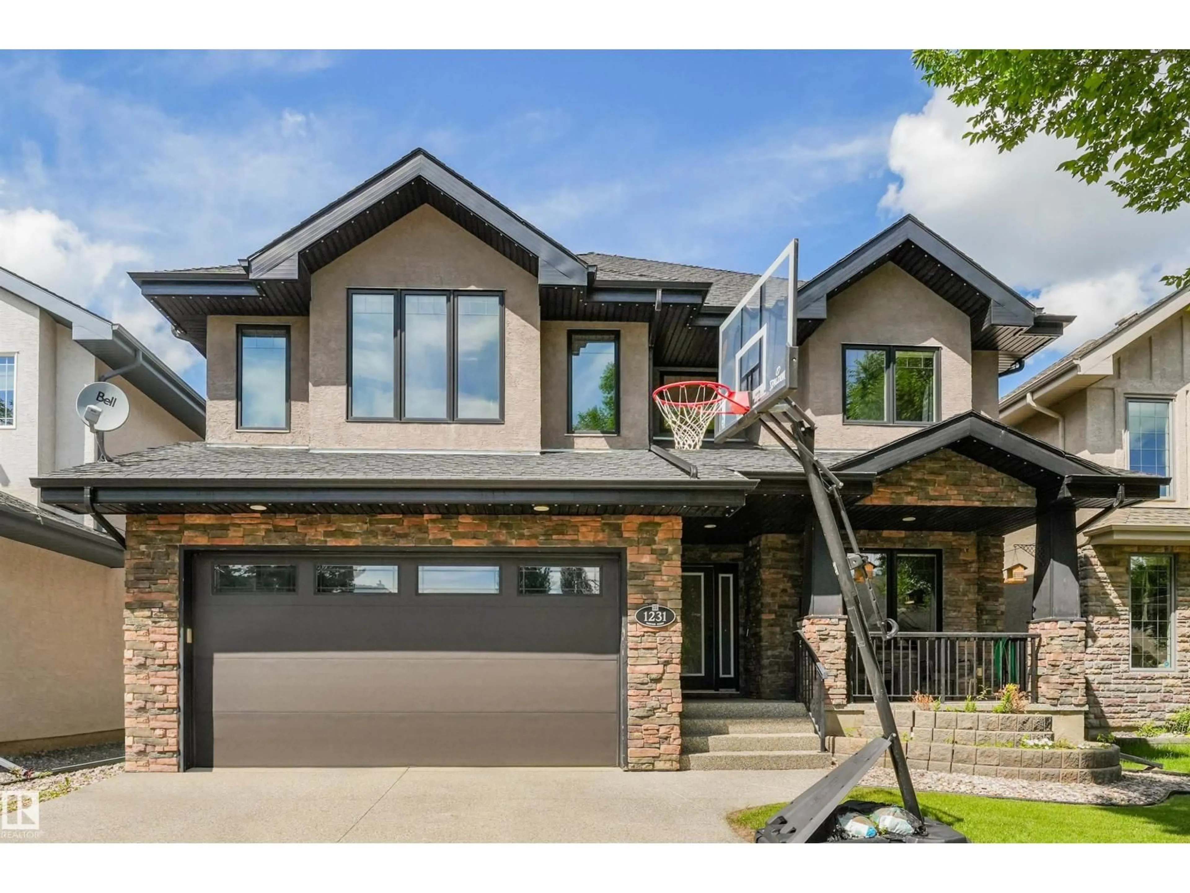 Home with brick exterior material, street for 1231 TREDGER CT, Edmonton Alberta T6R0B1