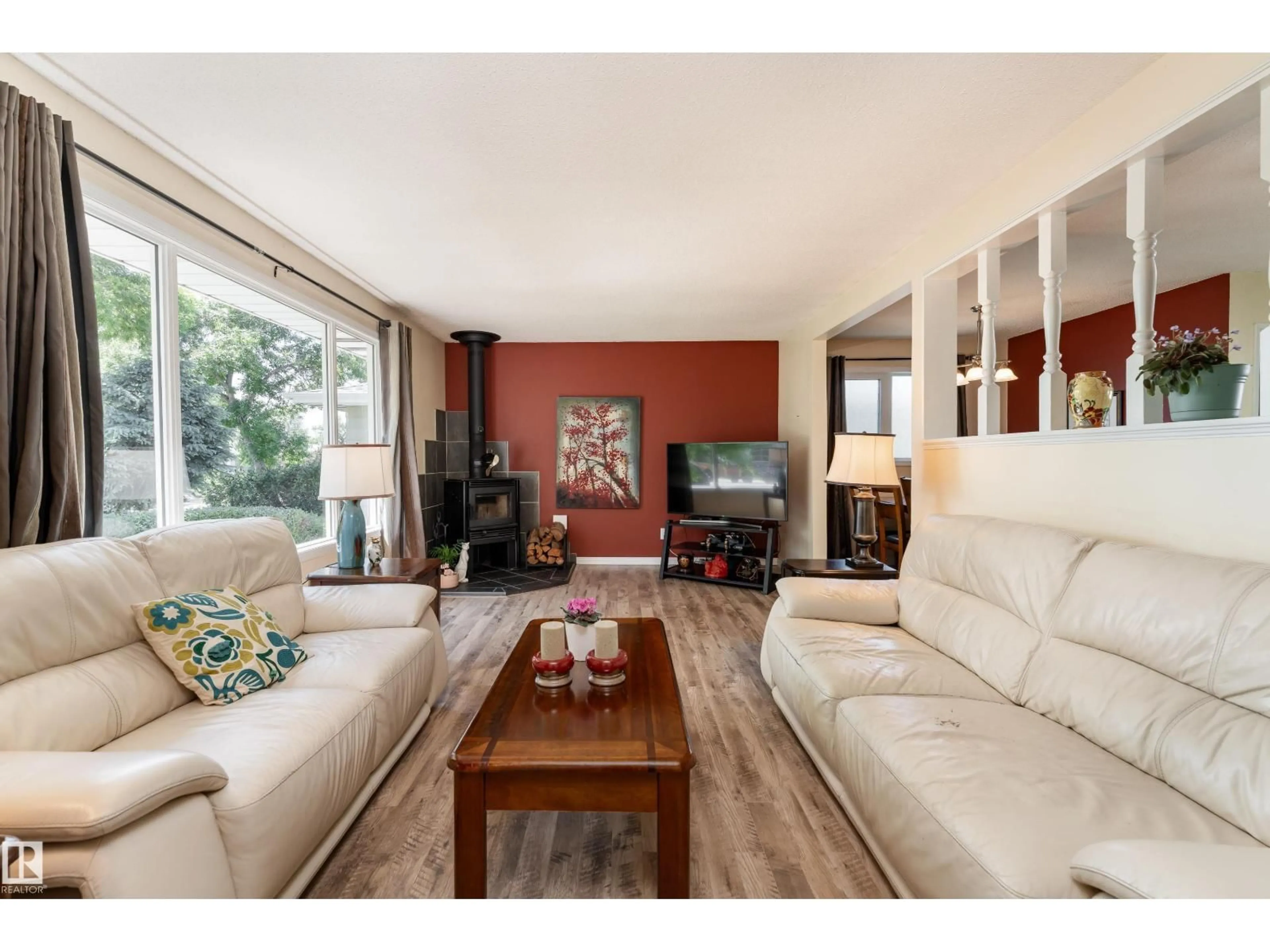 Living room with furniture, wood/laminate floor for 7 CAMELOT CR, Leduc Alberta T9E4L4