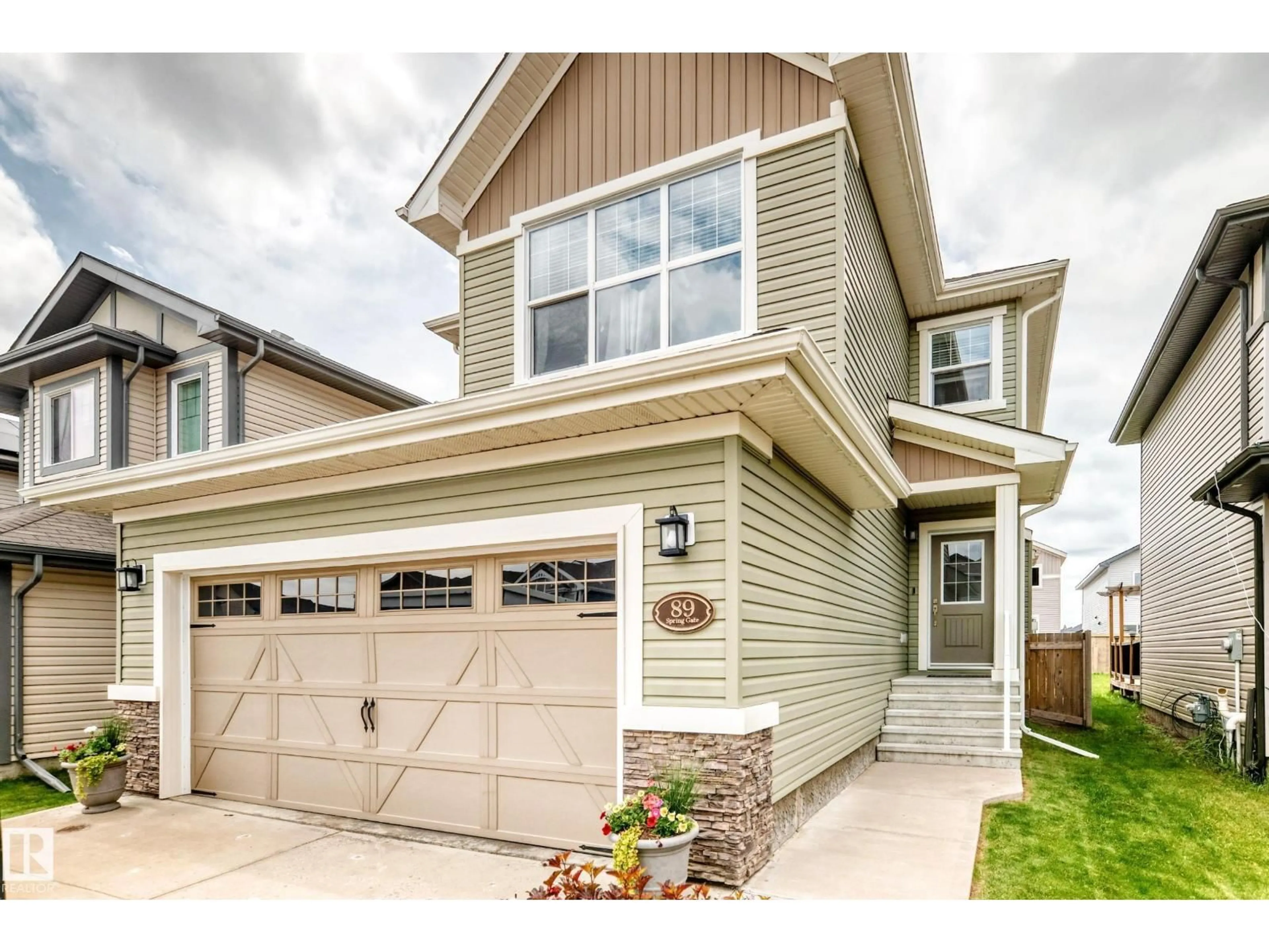 Home with vinyl exterior material, street for 89 SPRING GA, Spruce Grove Alberta T7X0S6
