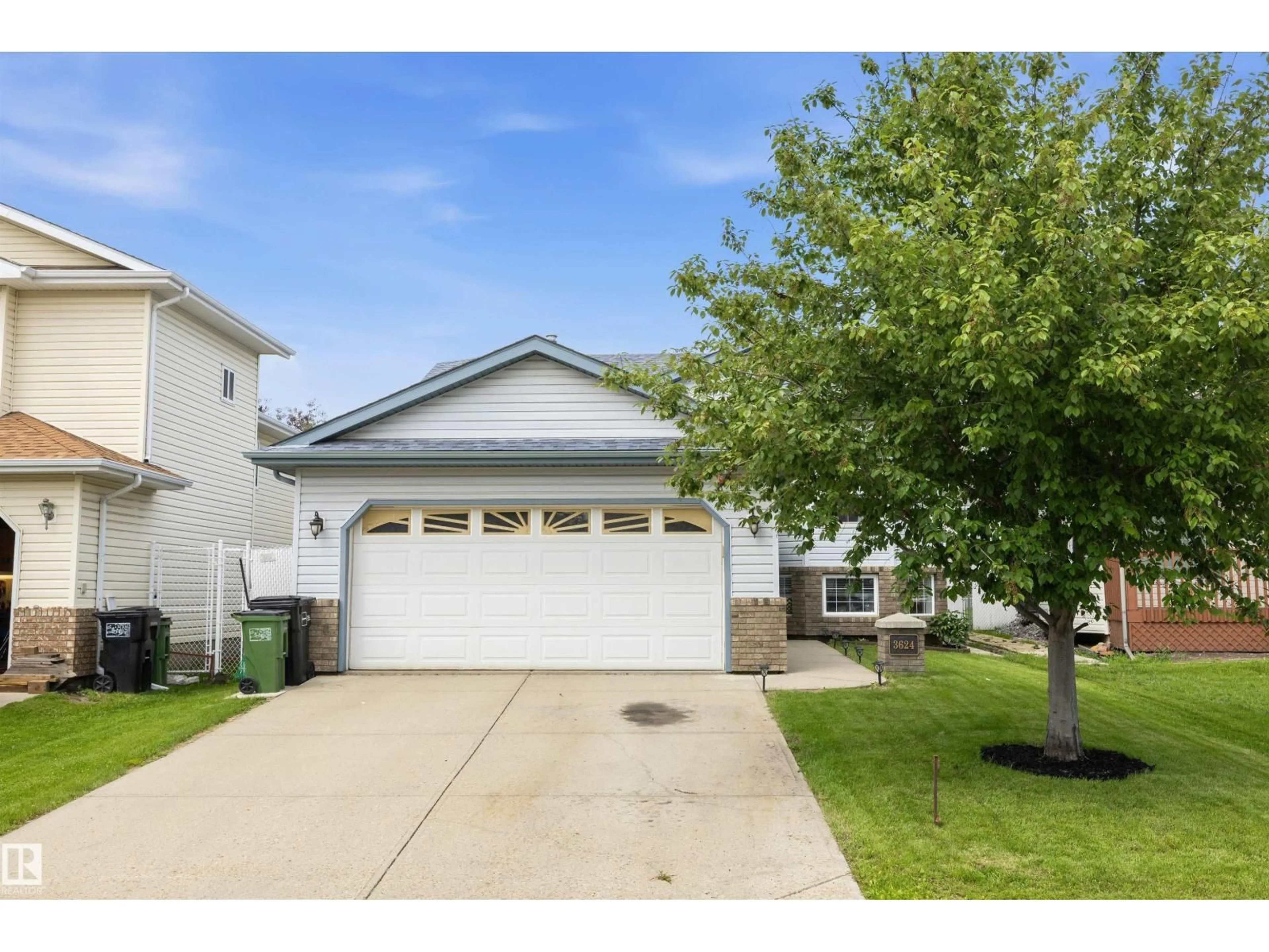 Home with vinyl exterior material, street for 3624 130 AV, Edmonton Alberta T5A4G1
