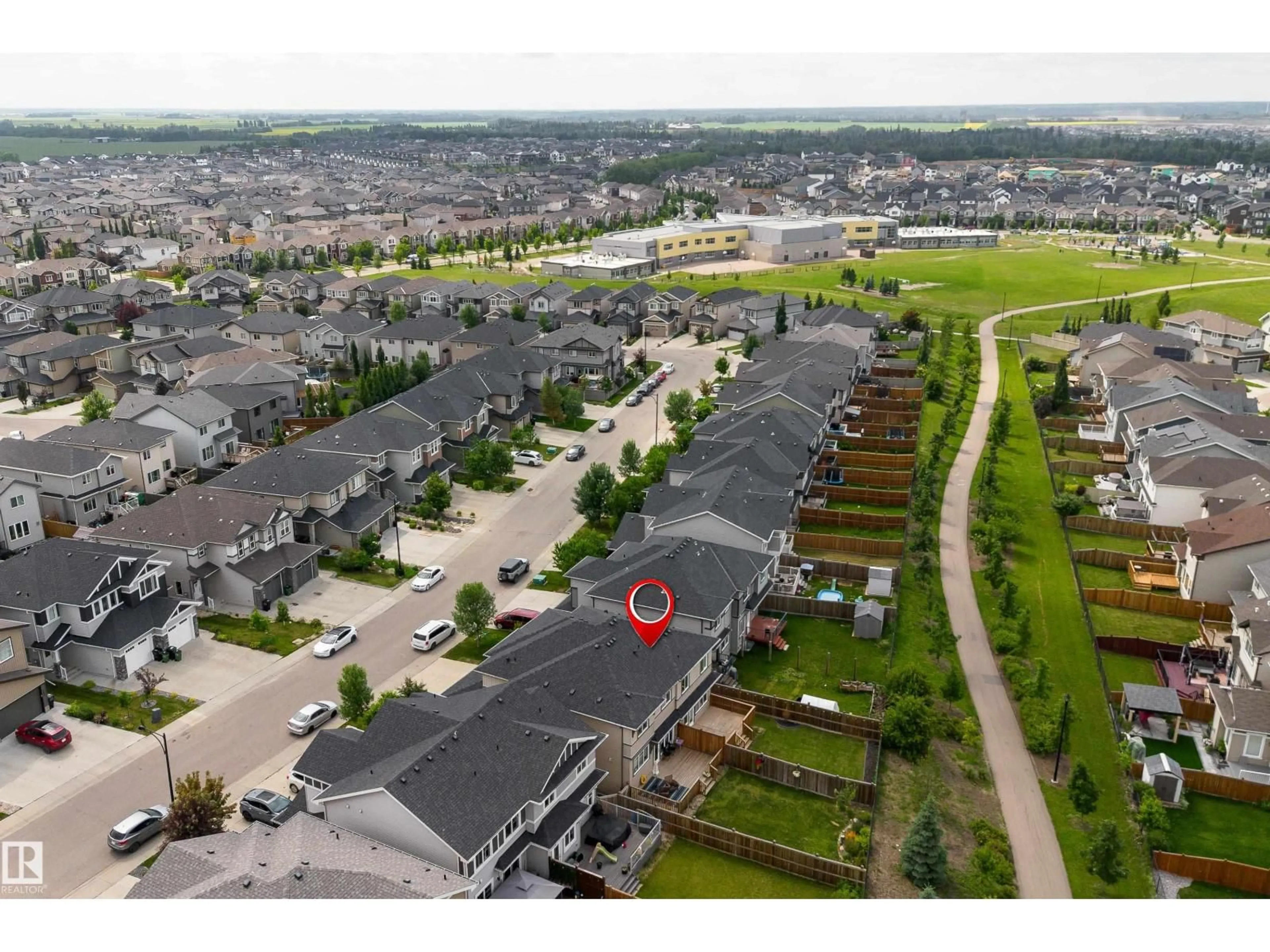A pic from outside/outdoor area/front of a property/back of a property/a pic from drone, unknown for 8589 CUSHING PL, Edmonton Alberta T6W3R4