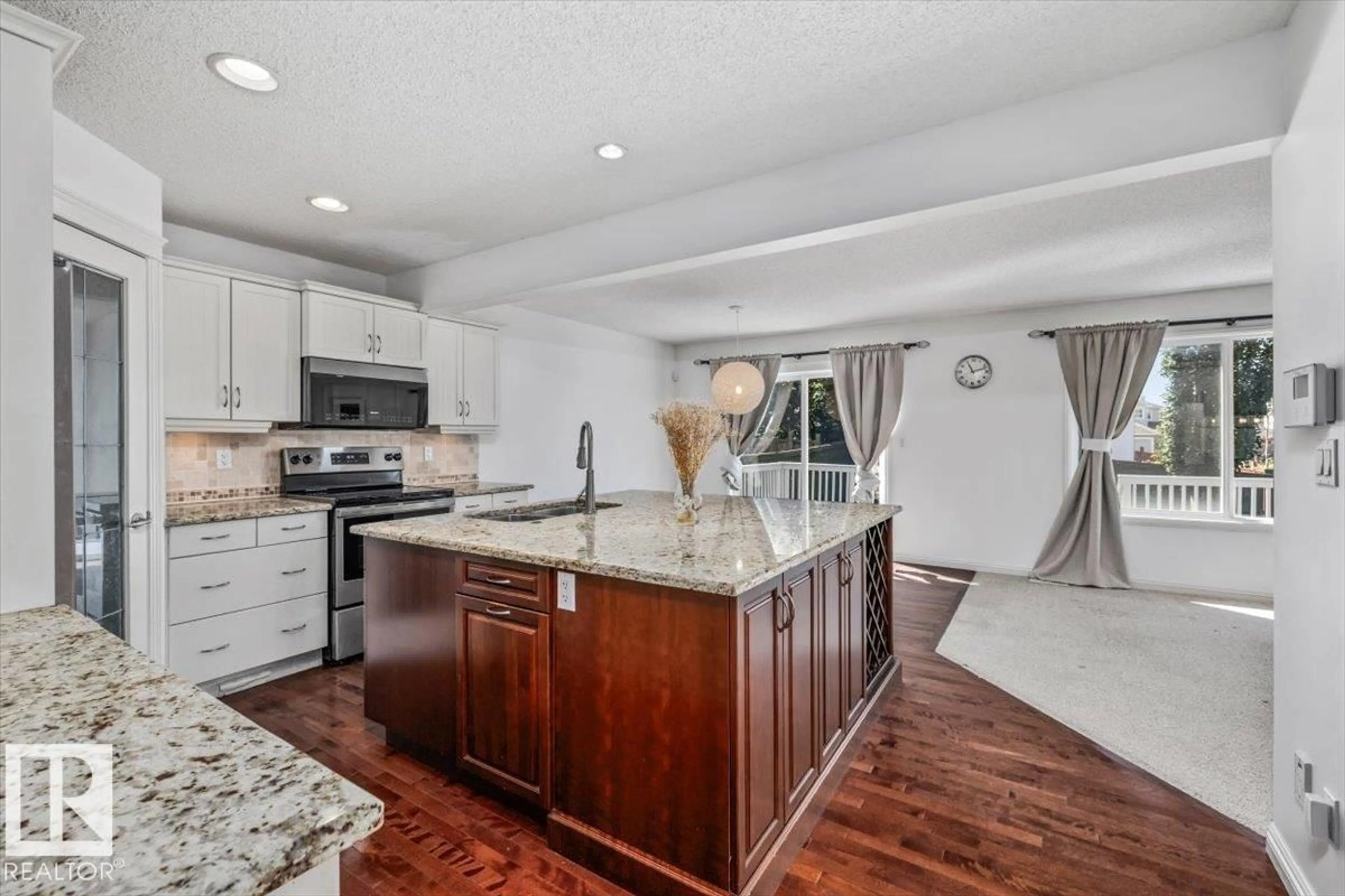 Open concept kitchen, ceramic/tile floor for 2407 HAGEN WY, Edmonton Alberta T6R3M6