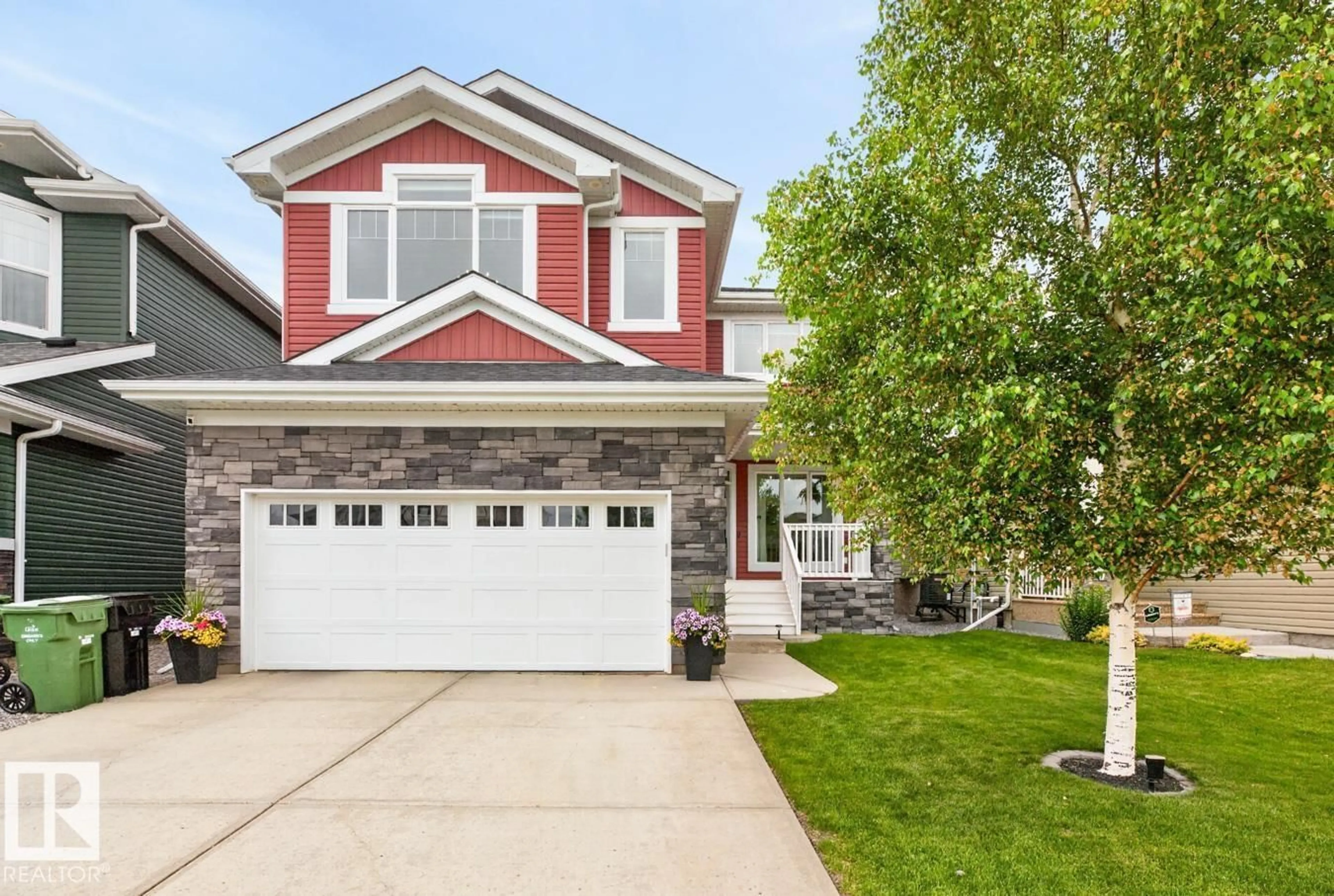 Home with vinyl exterior material, street for 122 KEYPORT CI, Leduc Alberta T9E0J3