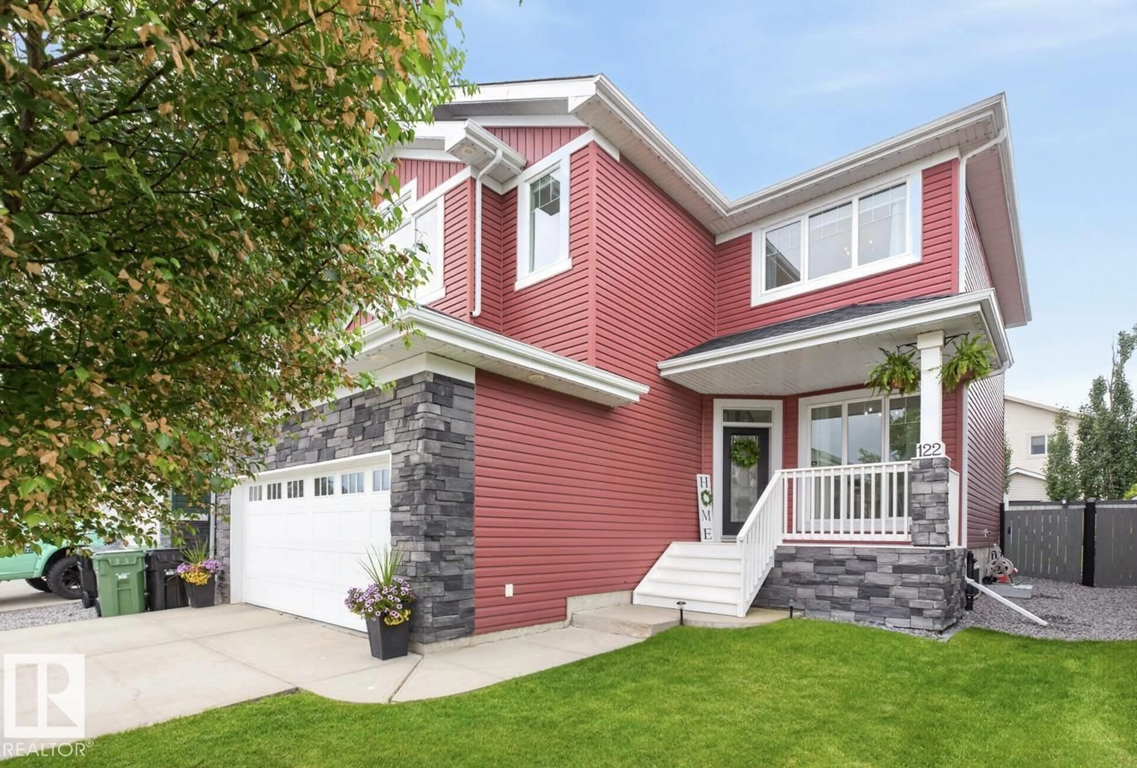 Home with vinyl exterior material, street for 122 KEYPORT CI, Leduc Alberta T9E0J3