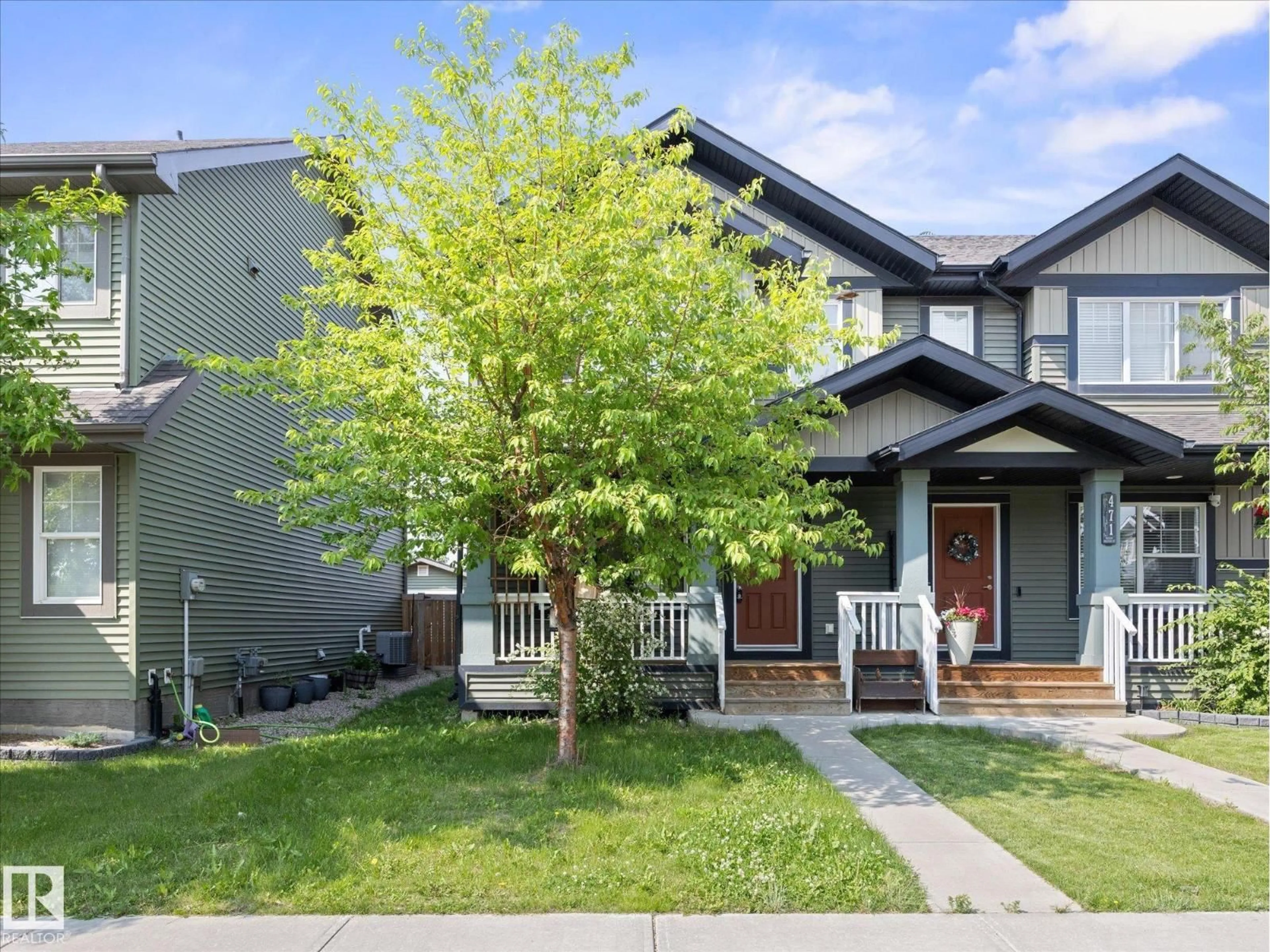 Home with vinyl exterior material, street for 473 ORCHARDS BV, Edmonton Alberta T6X2B7