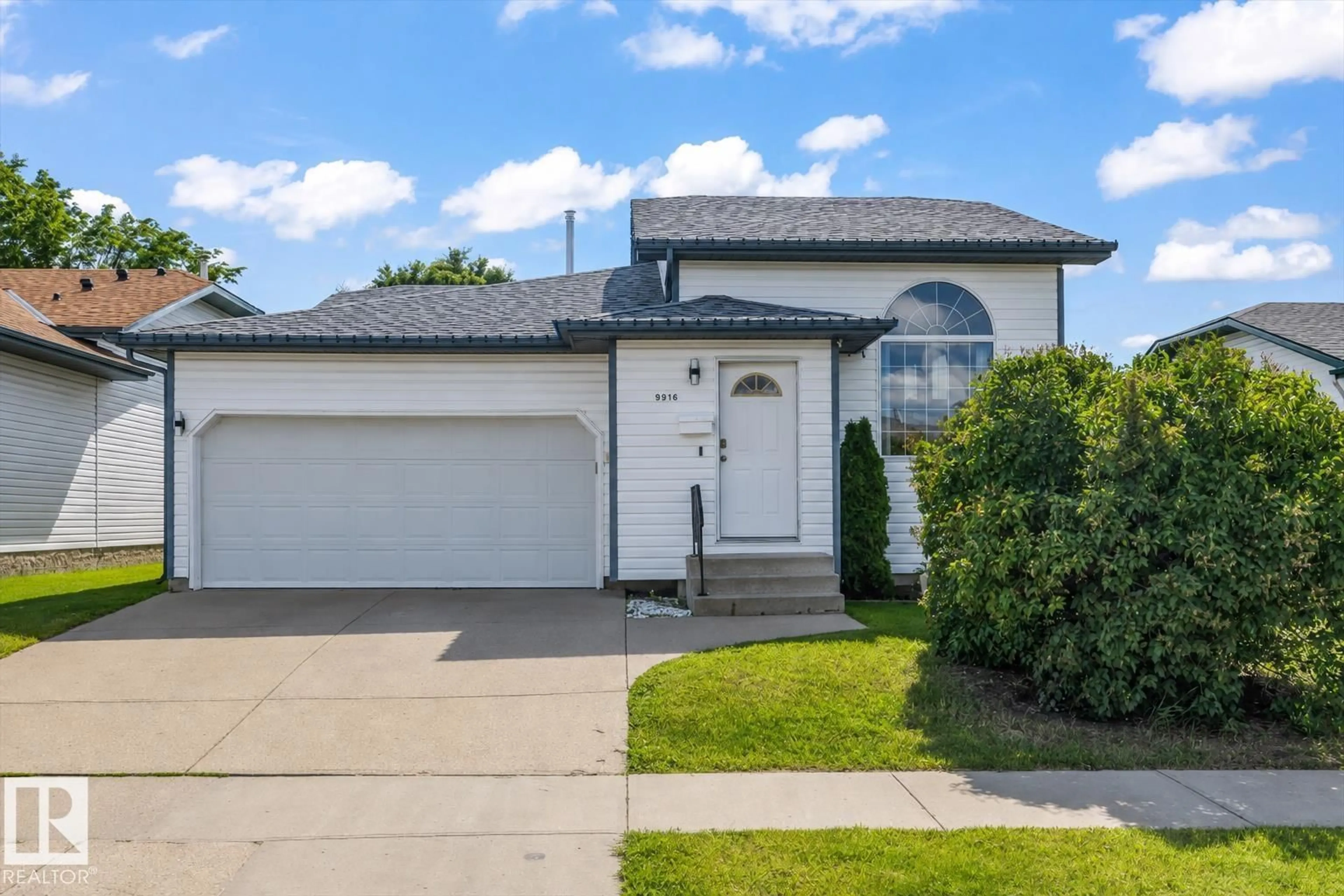 Home with vinyl exterior material, street for 9916 93 ST, Fort Saskatchewan Alberta T8L4H5