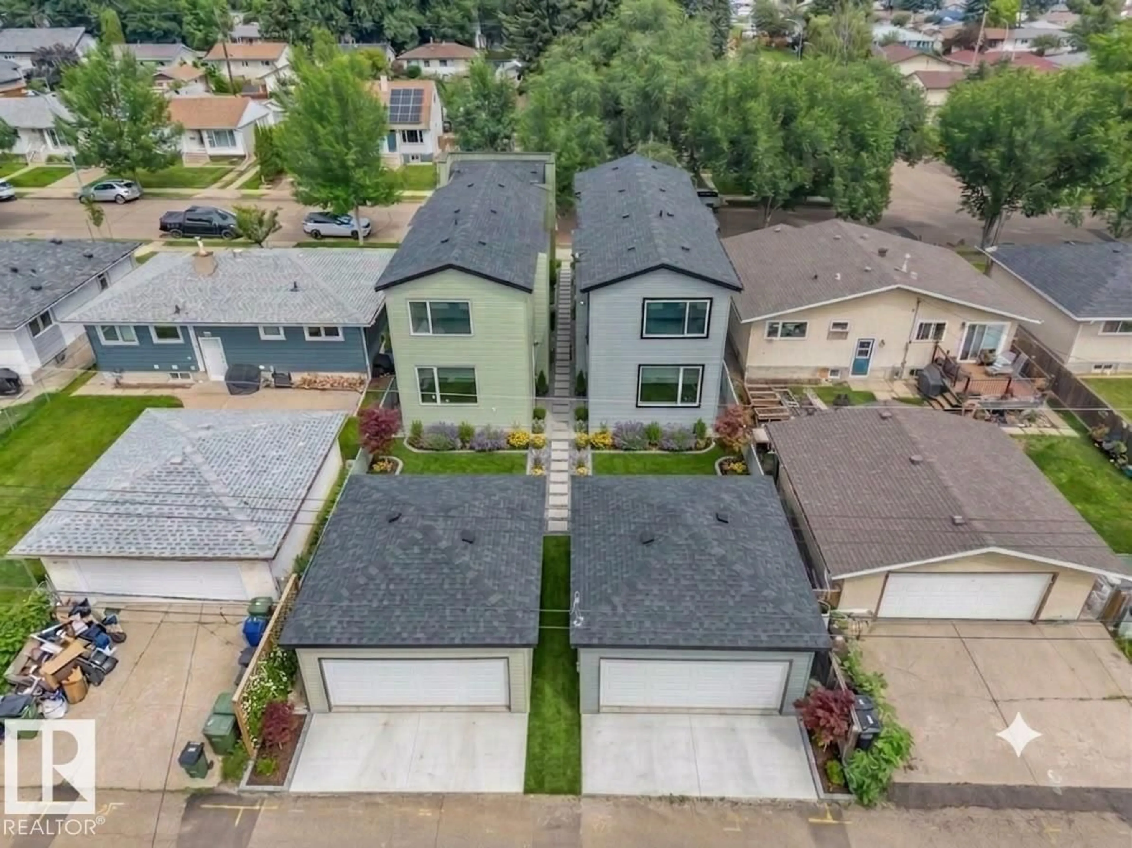 A pic from outside/outdoor area/front of a property/back of a property/a pic from drone, street for 3605 112 AVE, Edmonton Alberta T5W0M3