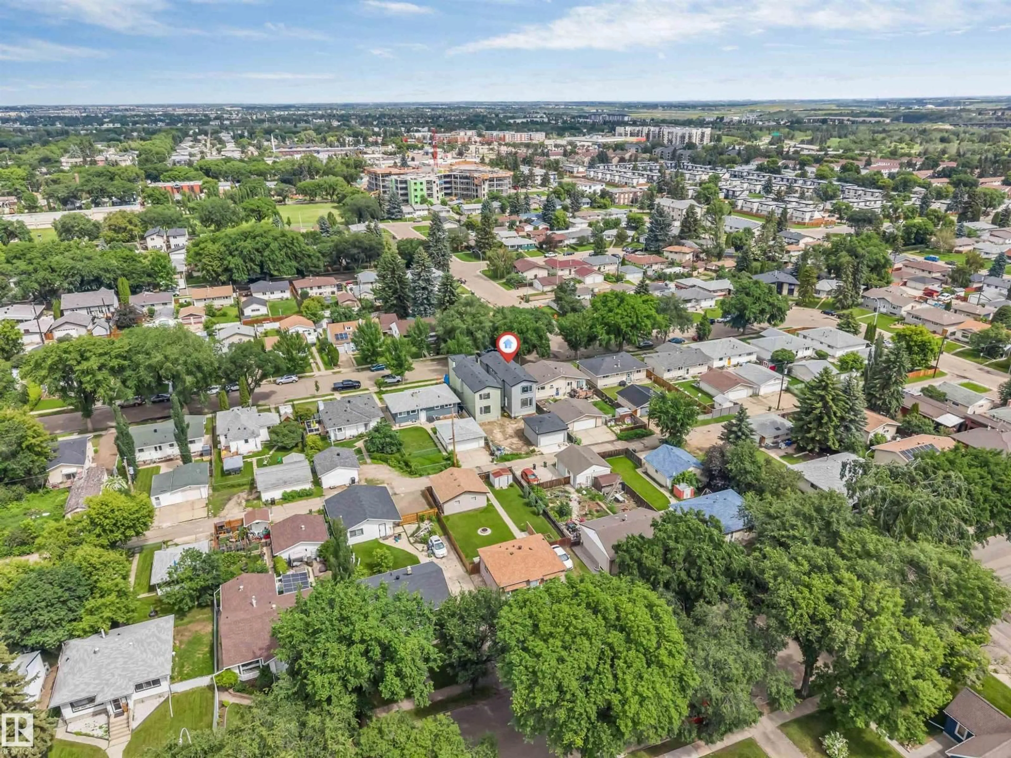 A pic from outside/outdoor area/front of a property/back of a property/a pic from drone, street for 3605 112 AVE, Edmonton Alberta T5W0M3