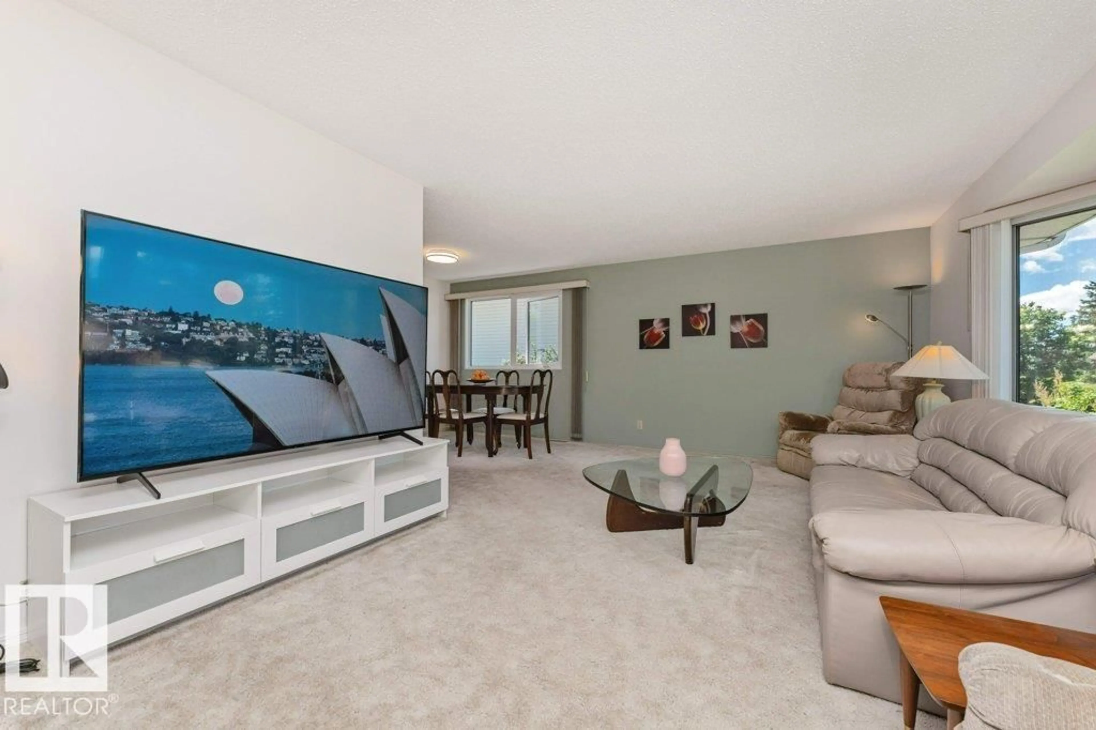 Living room with furniture, unknown for NW - 11415 56 AV, Edmonton Alberta T6H0Y1